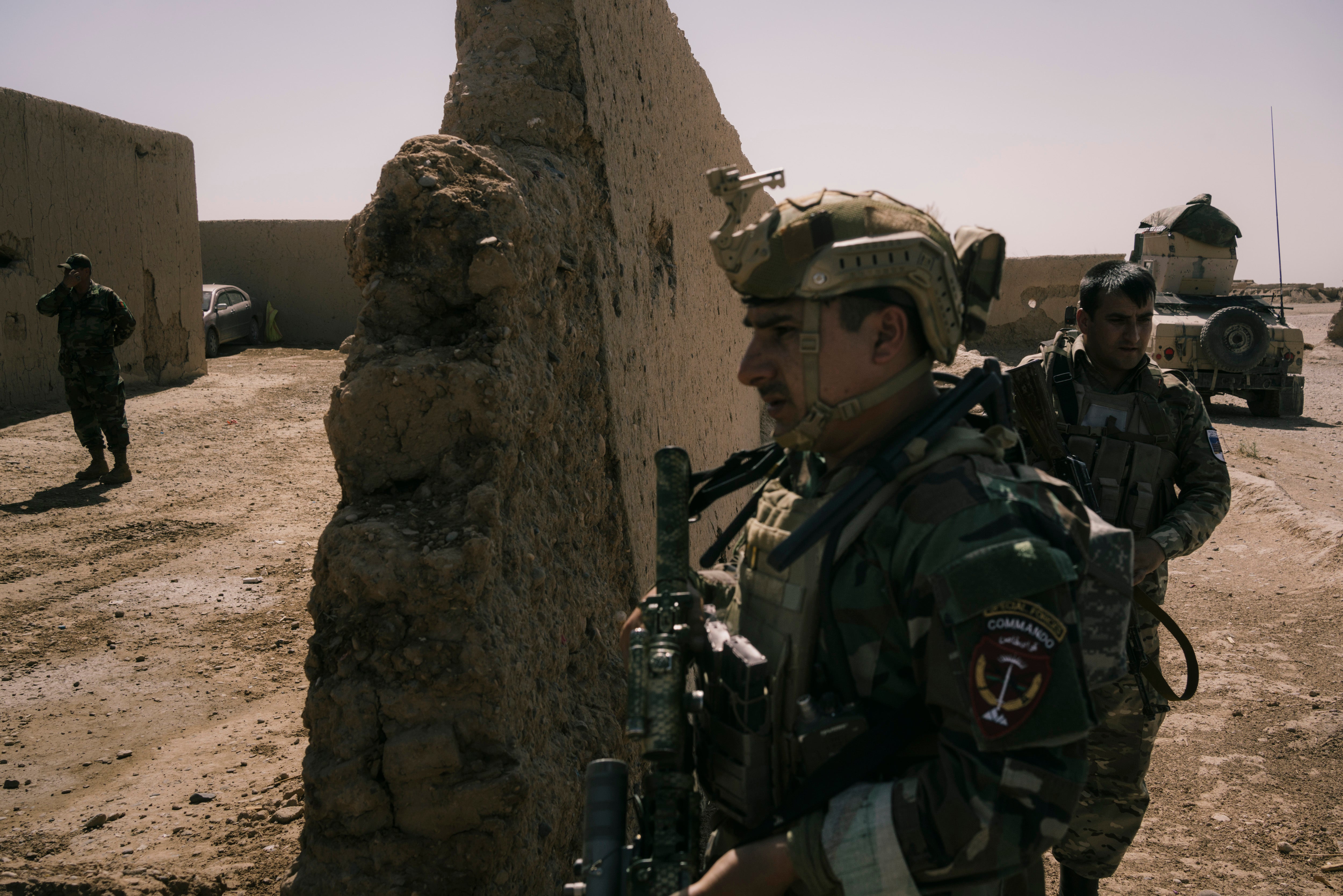 Afghan special forces arrive at Bolan Qala army outpost near the city of Lashkar Gah