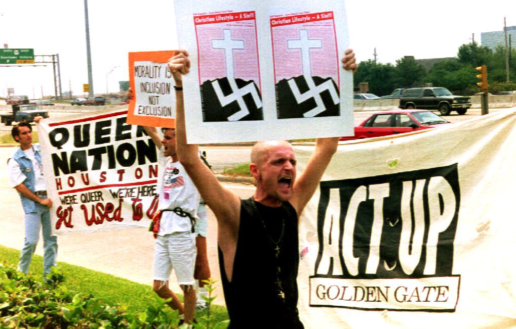 1992: Queer protesters march in front of a Houston hotel where Rev Jerry Falwell is speaking about religion and family values