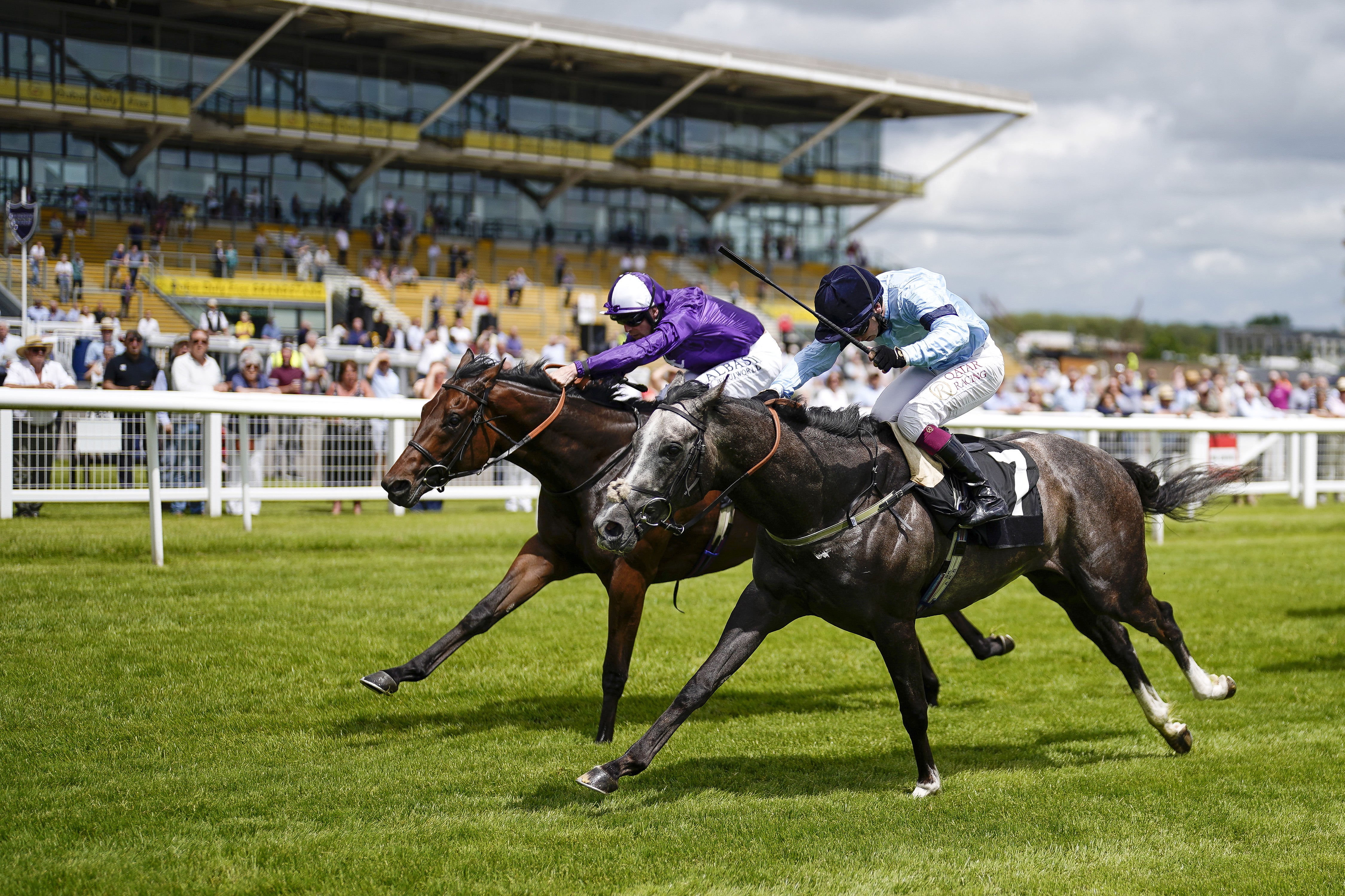 Great Max (left) on his way to victory at Newbury