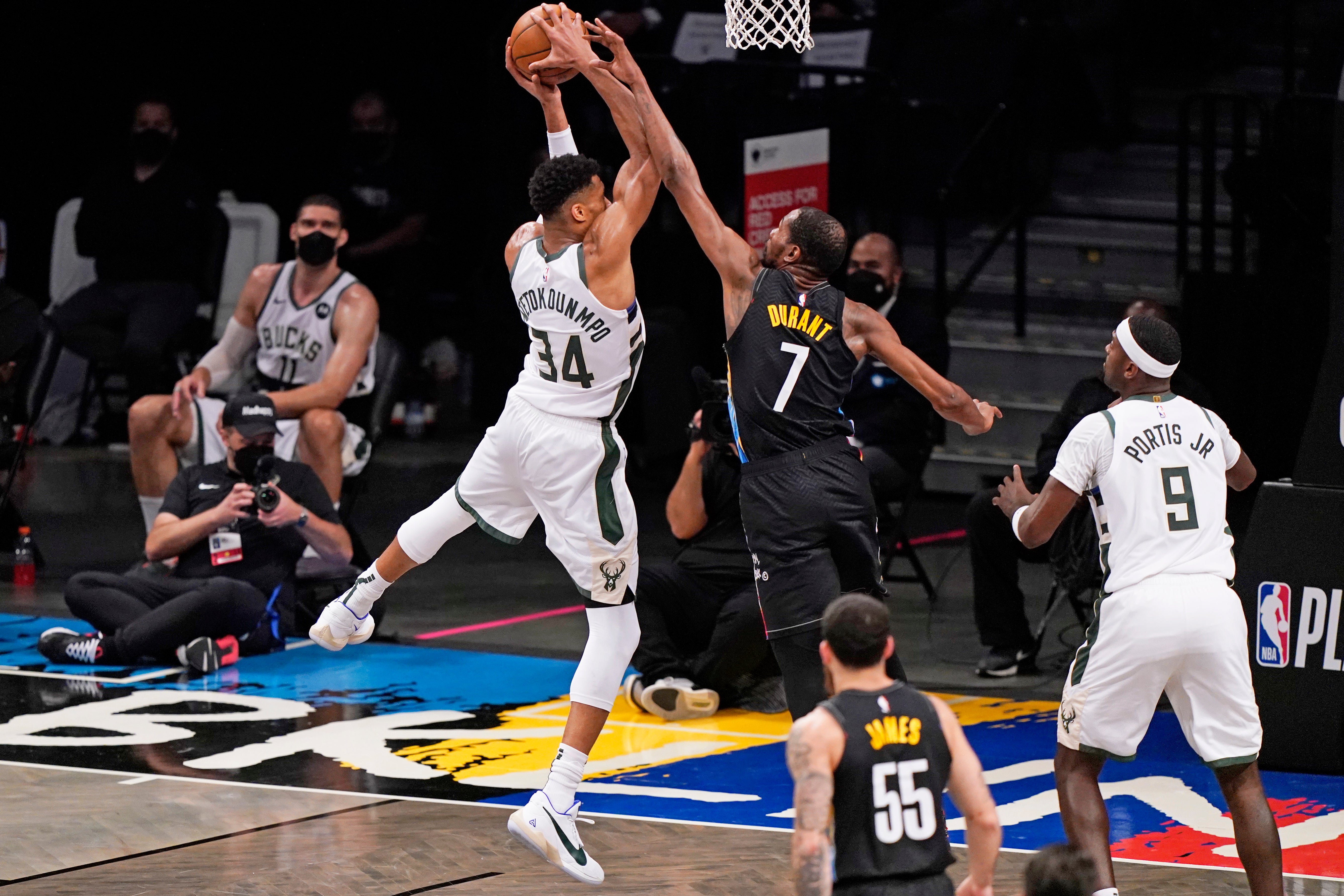 Brooklyn Nets forward Kevin Durant (7) tries to block a shot by Milwaukee Bucks forward Giannis Antetokounmpo