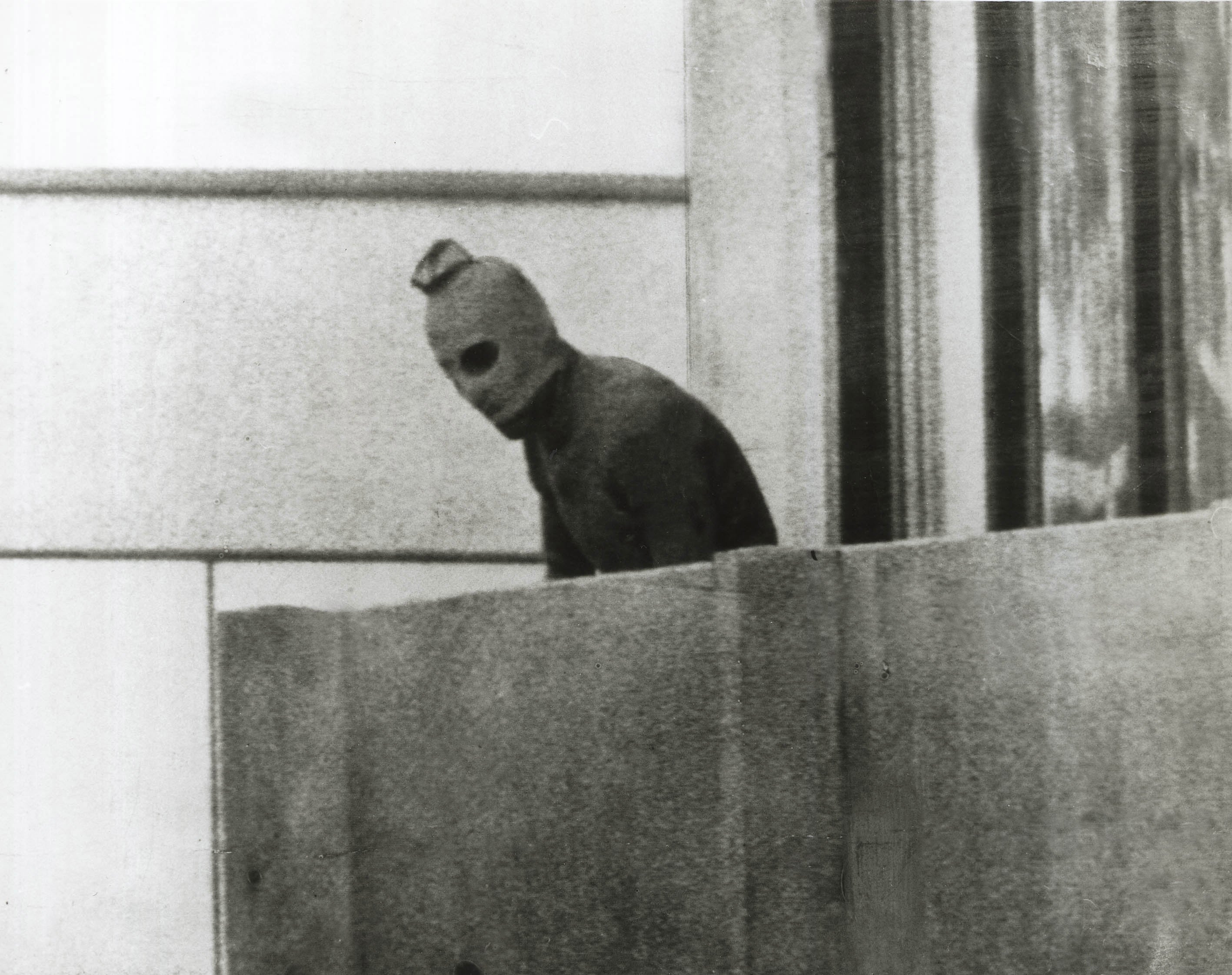 Defining moment: a hooded Palestinian on the balcony above the Israeli athletes