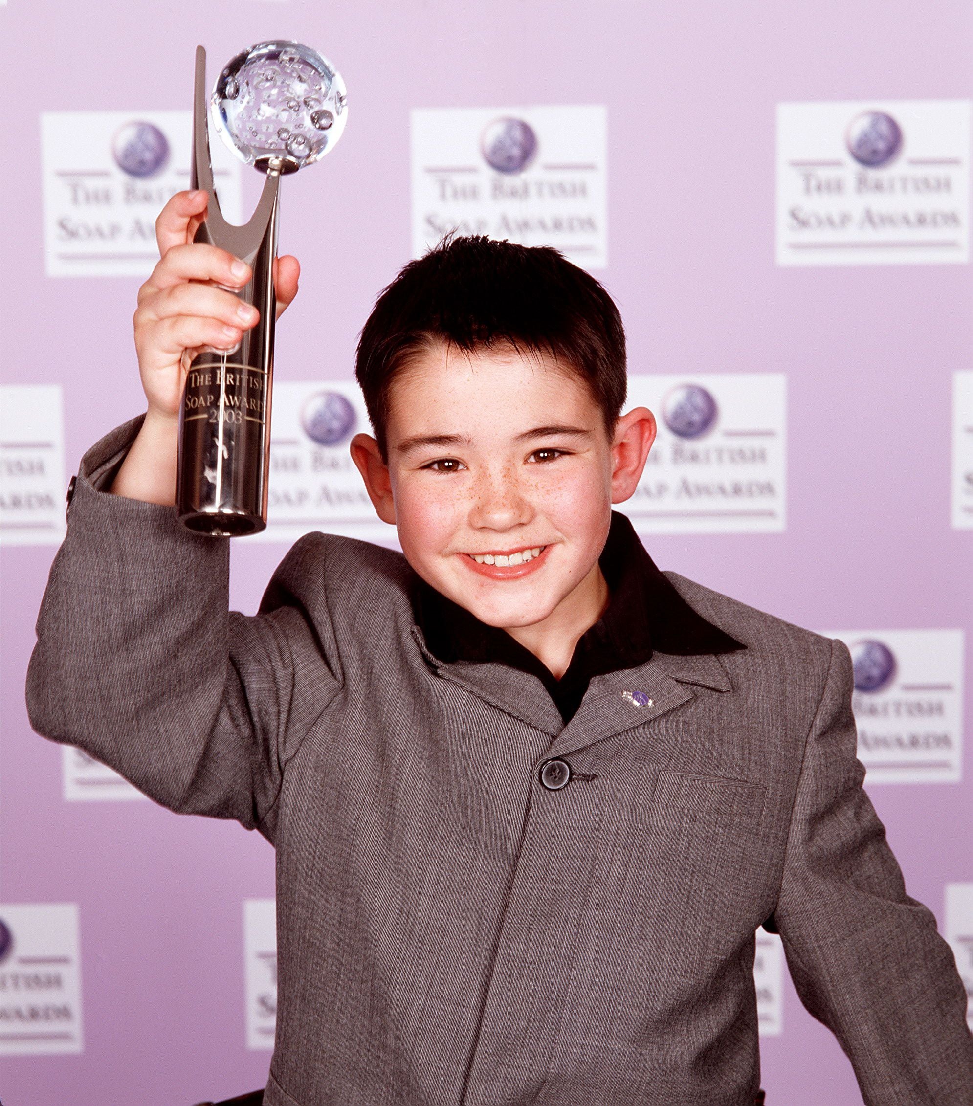 Jack McMullen in 2003, holding his British Soap award for Best Newcomer