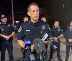 One suspect arrested and another remains at large after Texas mass shooting that injured 14 people