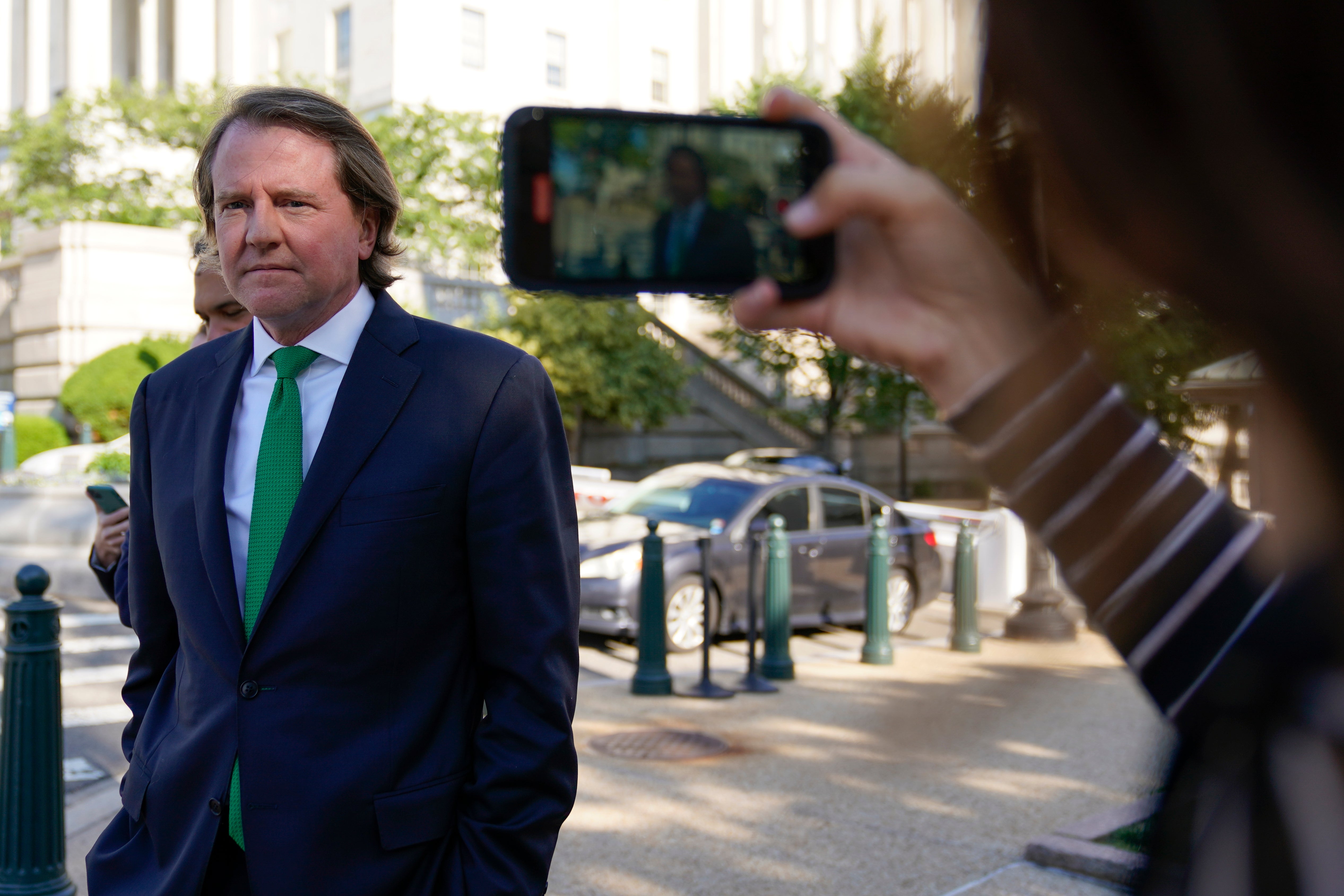 Former White House counsel Don McGahn departs after appearing for questioning behind closed doors by the House Judiciary Committee on Capitol Hill in Washington, Friday, June 4, 2021.