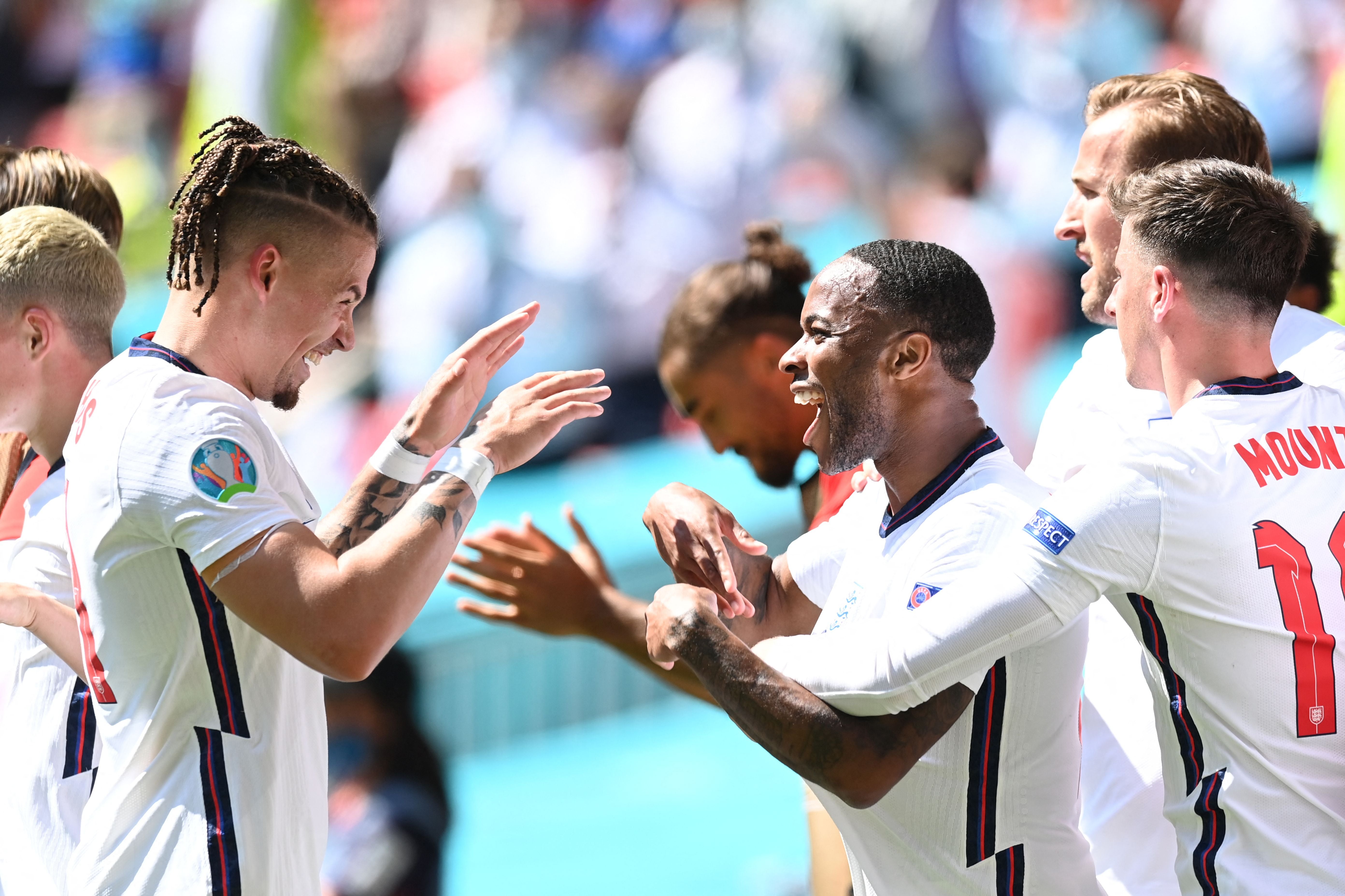 Raheem Sterling celebrates with Kalvin Phillips