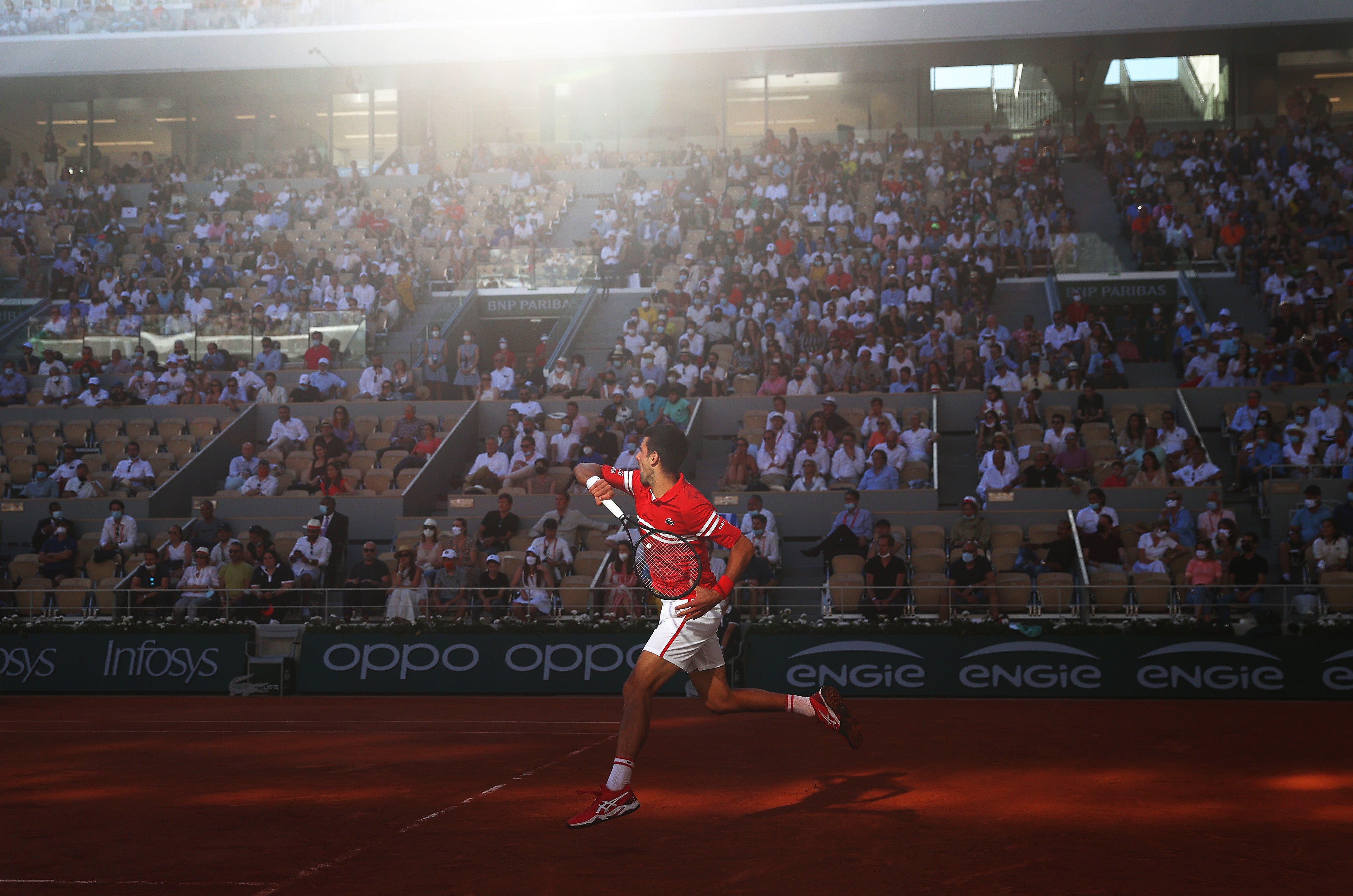 Djokovic fought from two sets down to win in five against Tsitsipas