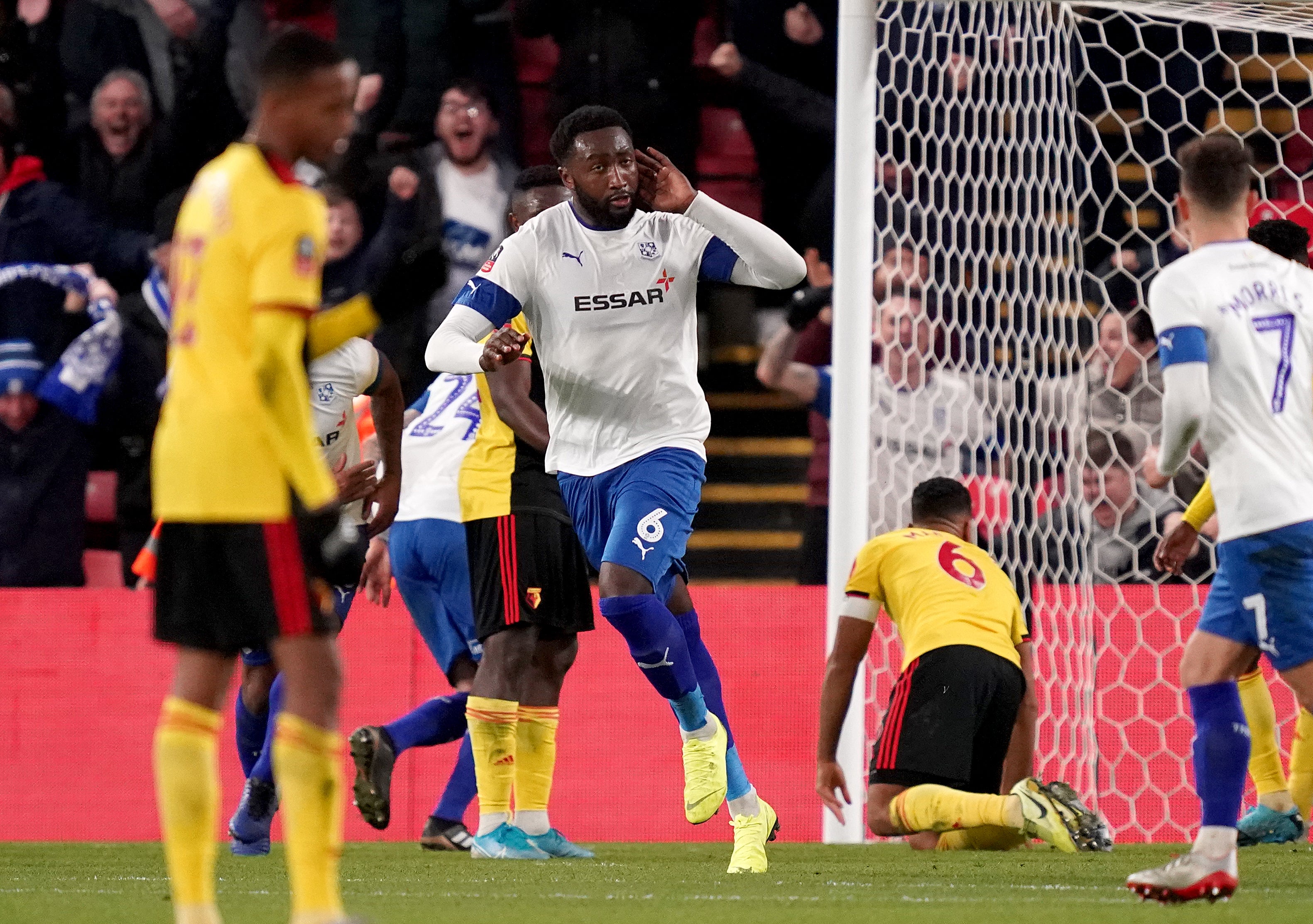 Manny Monthe (centre) celebrates scoring for Tranmere