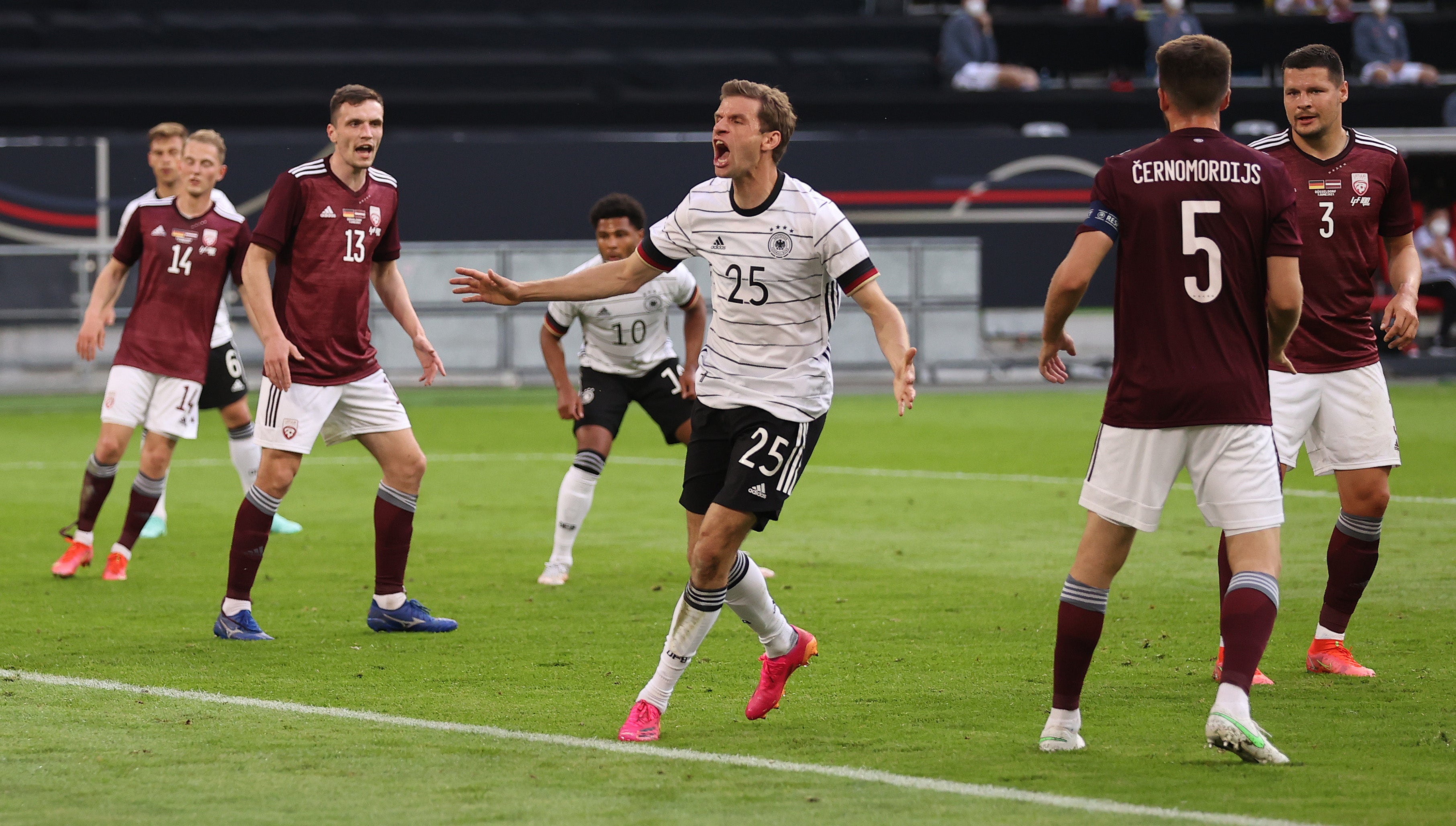 Muller celebrates scoring against Latvia