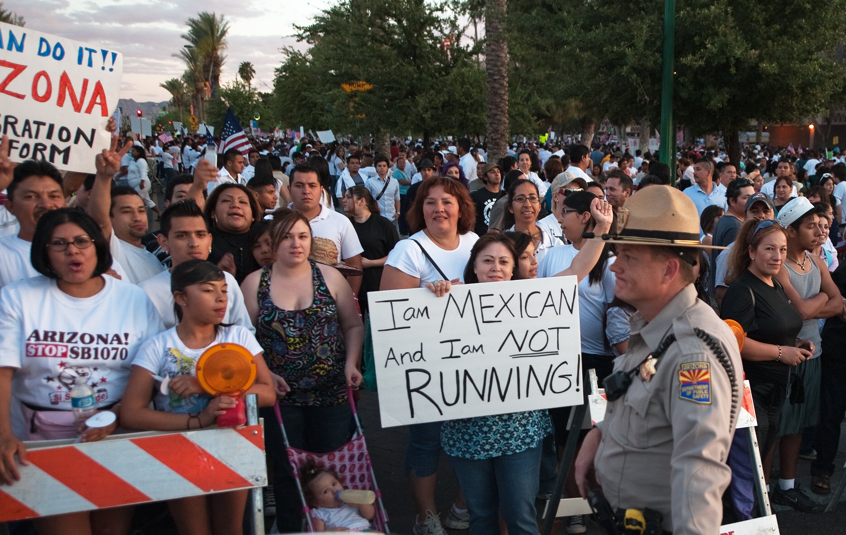 Protesters gather around the Arizona State Capitol against the State Senate bill 1070, which eventually passed and allowed law enforcement to inquire about people’s immigration status during arrests. (PAUL J. RICHARDS/AFP via Getty Images)