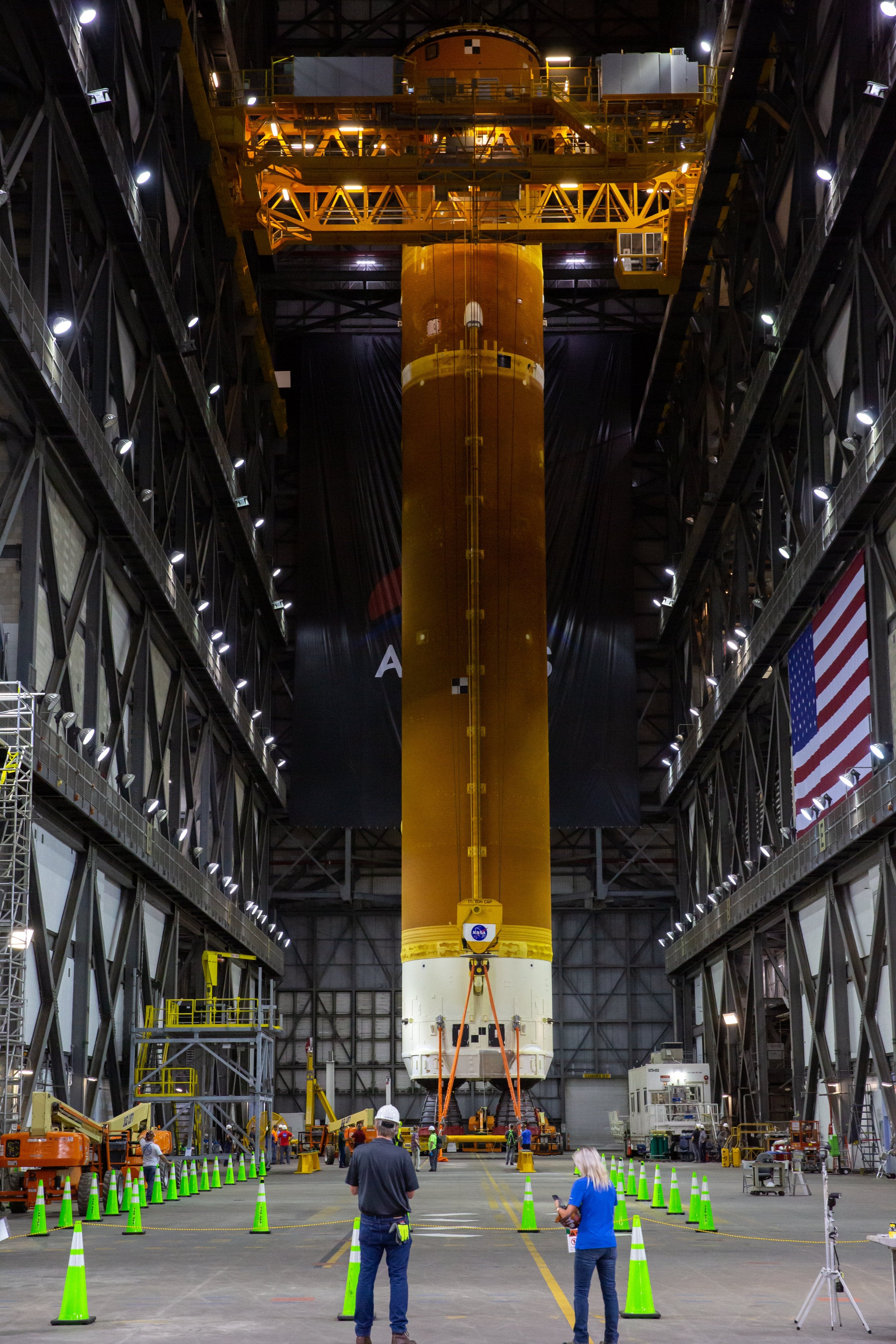 The SLS rocket core stage lift operations photographed in the transfer aisle of the Vehicle Assembly Building at Nasa’s Kennedy Centre