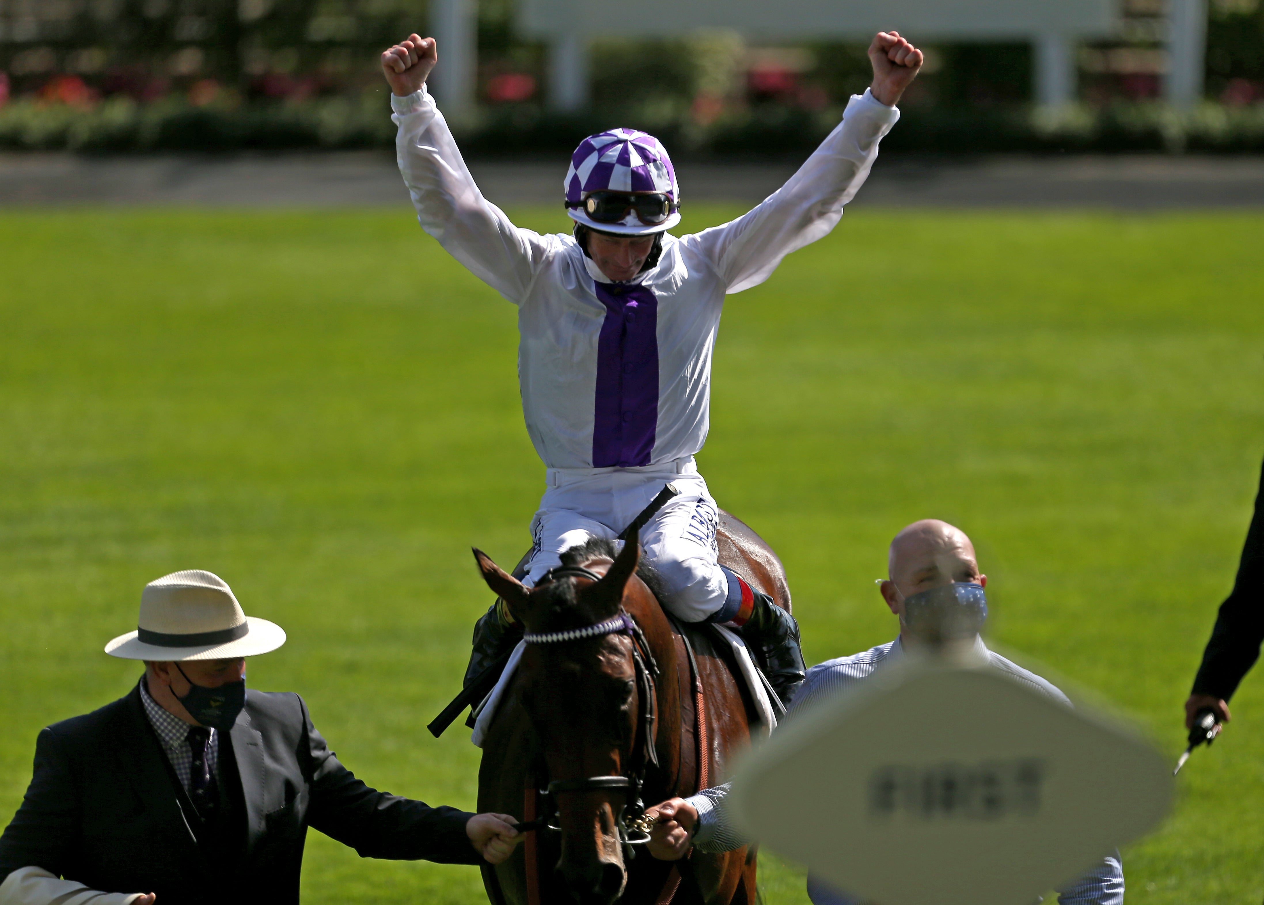 Jockey Kevin Manning celebrates Poetic Flare's breath-taking victory in the St James’s Palace Stakes at Royal Ascot