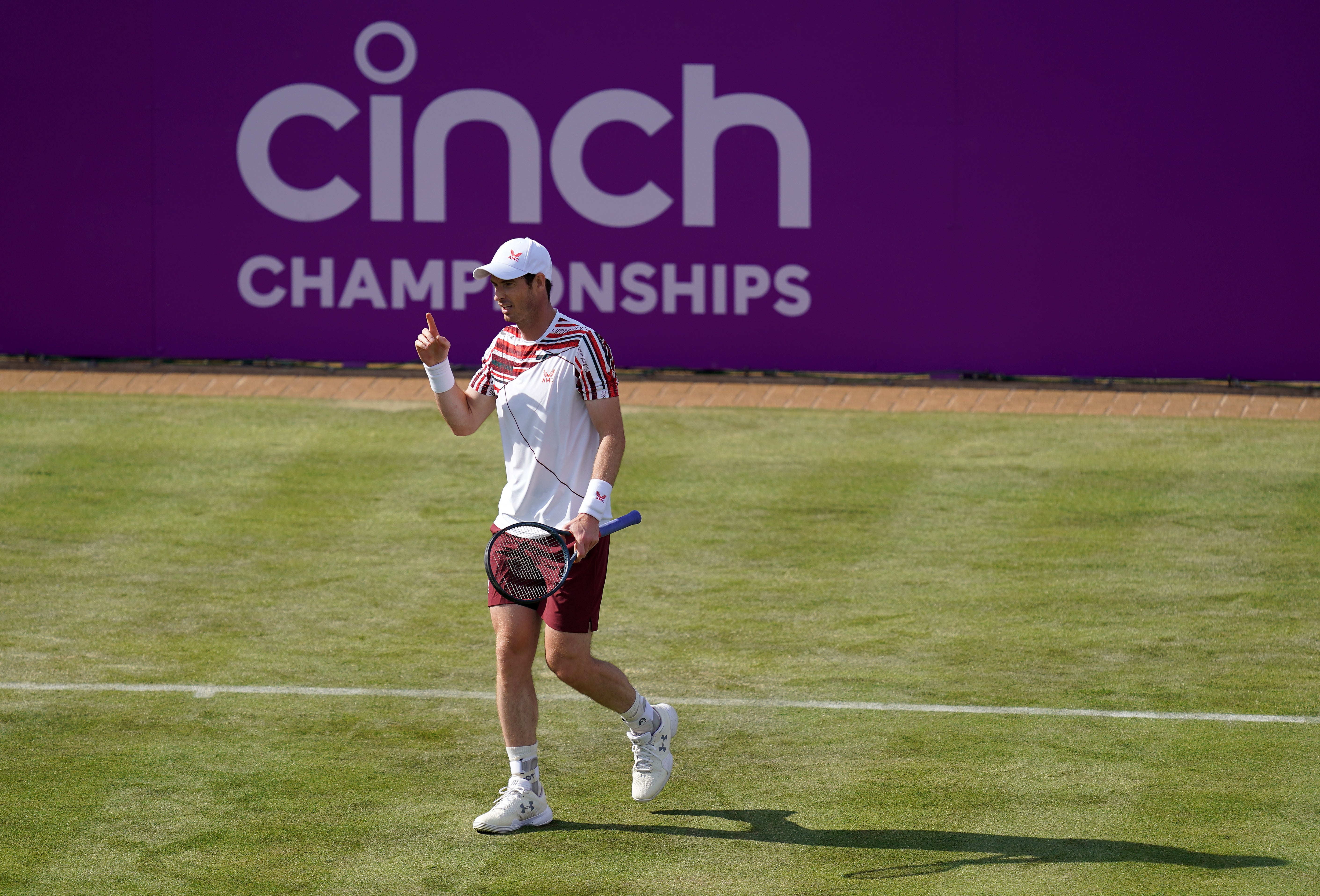 Andy Murray beat Benoit Paire on his return to Queen's