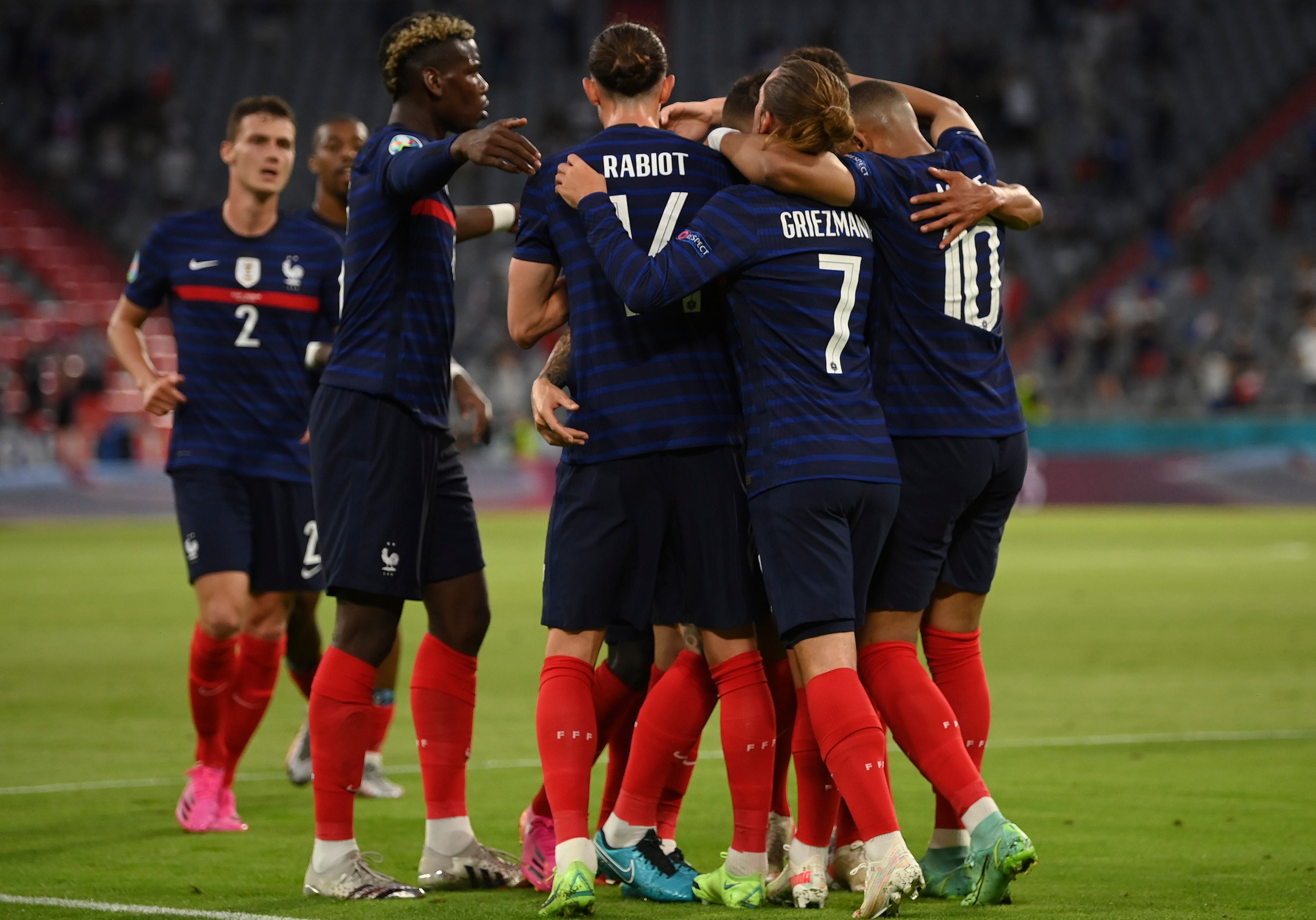 French players celebrate after scoring their side’s first goal during the Euro 2020 Group F match against France and Germany in Munich