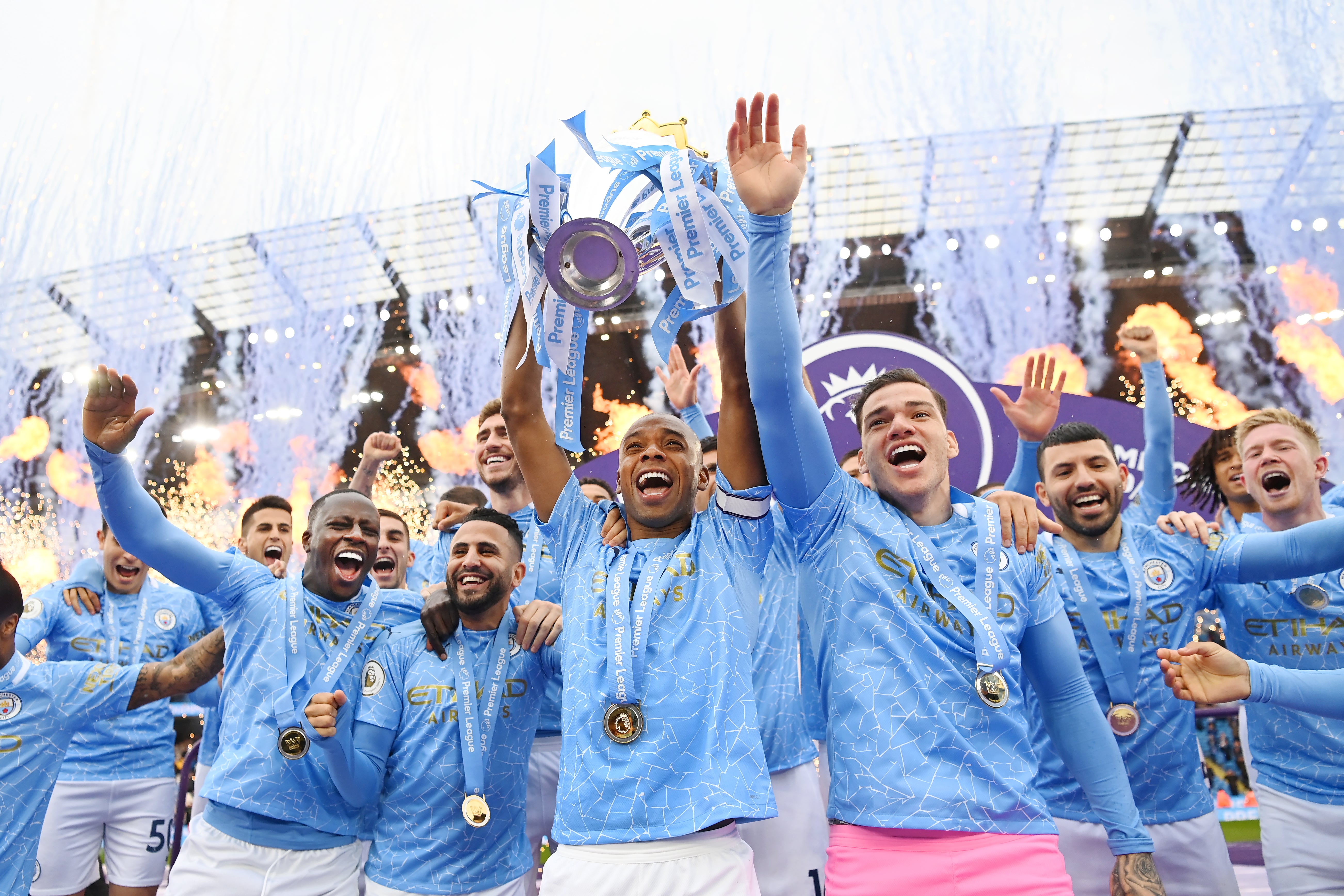 Fernandinho of Manchester City lifts the Premier League Trophy