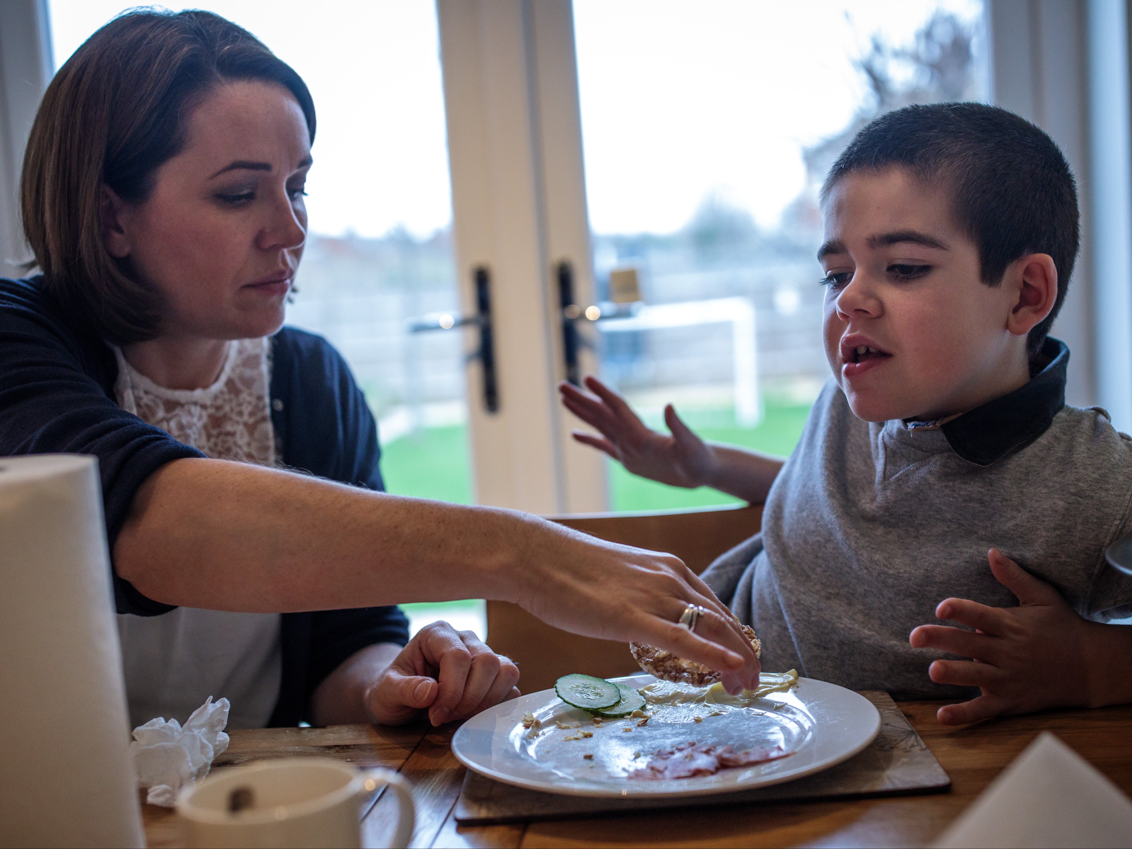 Alfie Dingley with his mother Hannah Deacon