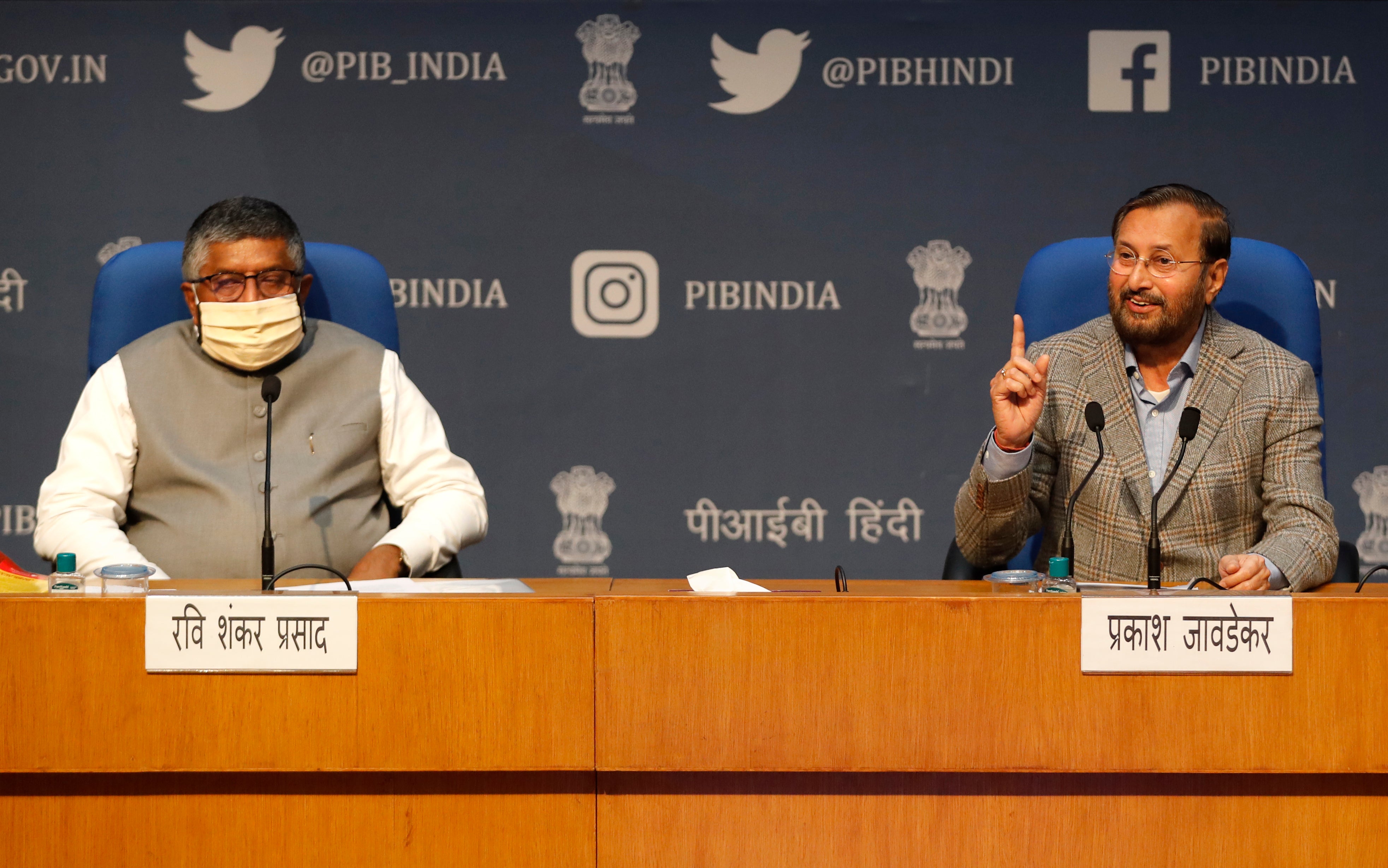 File image: India's IT Minister Ravi Shankar Prasad, left, and Information and Broadcasting Minister Prakash Javadekar address a press conference announcing new regulations for social media companies in February