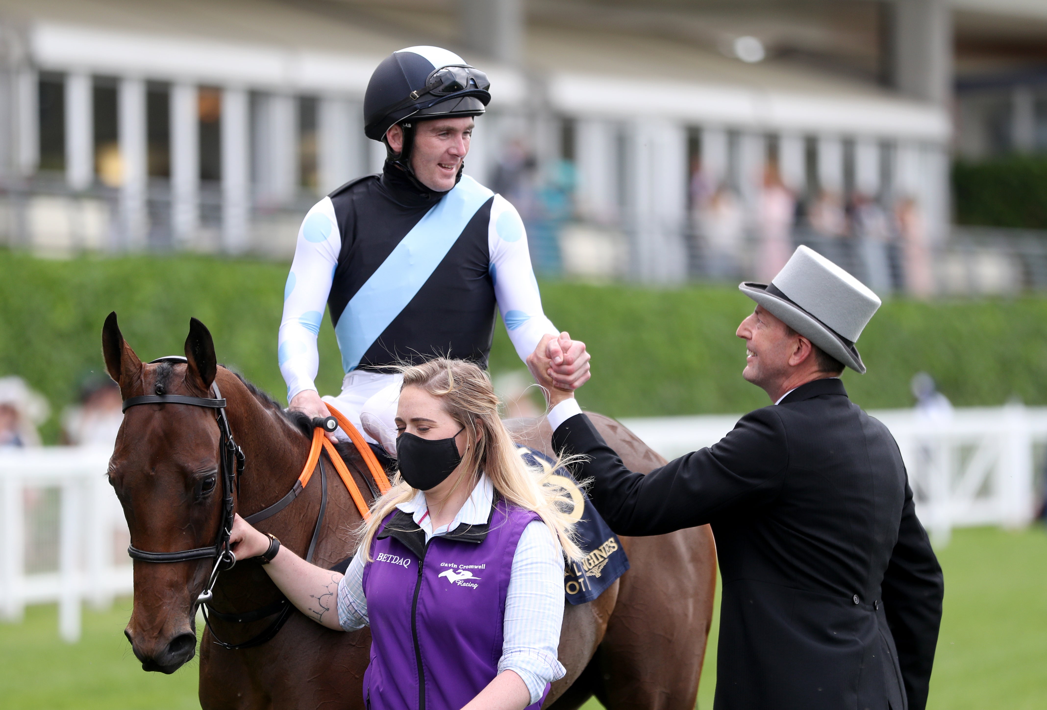 Jockey Gary Carroll and trainer Gavin Cromwell celebrate after Quick Suzy's victory in the Queen Mary Stakes at Royal Ascot