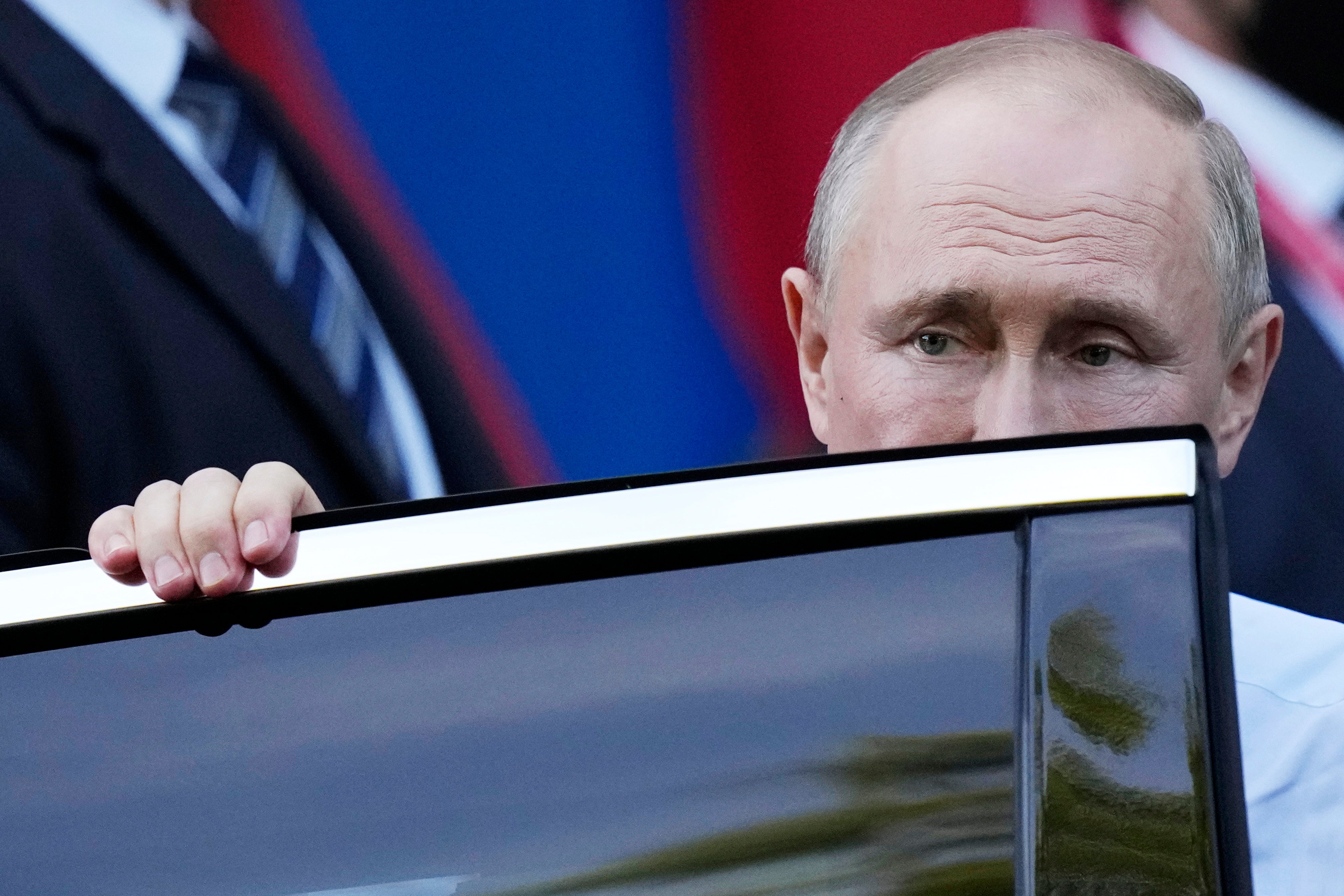 Russian president Vladimir Putin leaving Villa La Grange