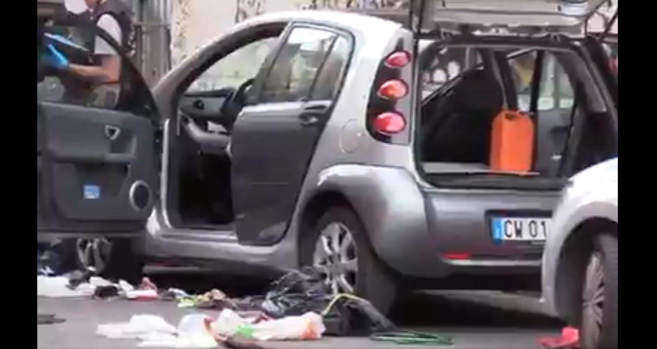 A still from the video of Italian security officials conducting operations to defuse the suspected bomb found near Olympic Stadium, Rome