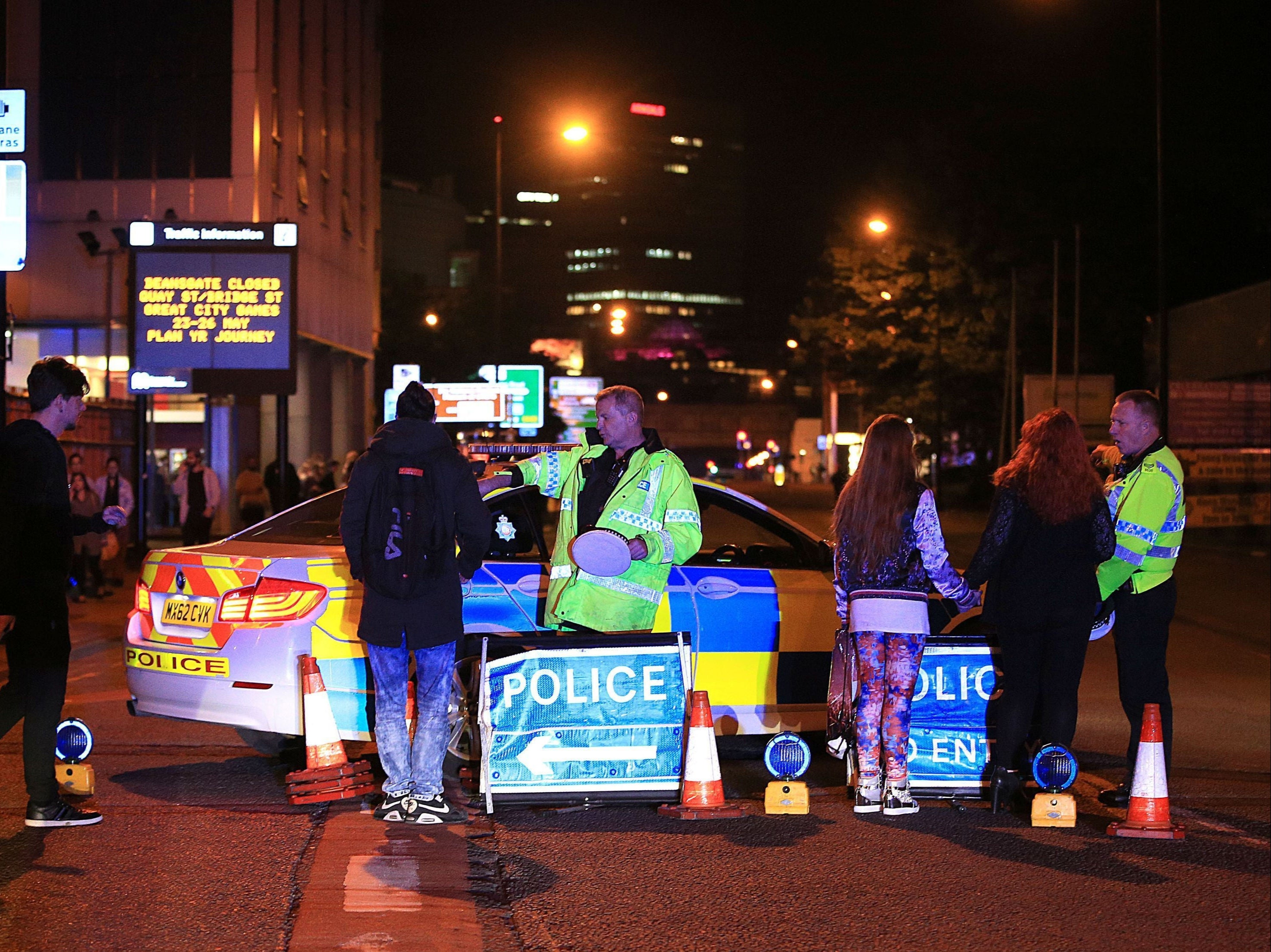 Police at the Manchester Arena in May 2017 after the deadly suicide attack, which killed 22 people