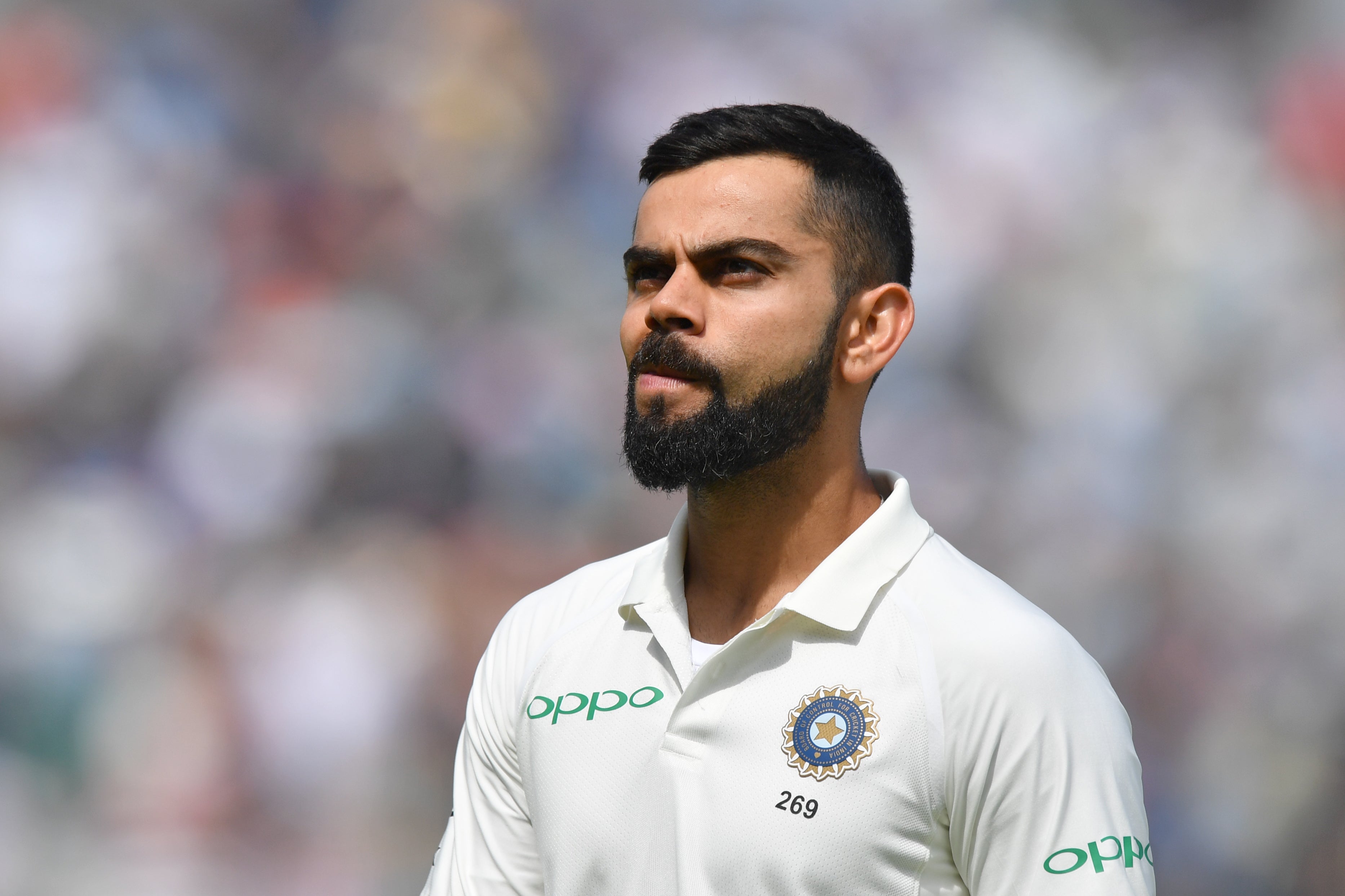 Virat Kohli looks on