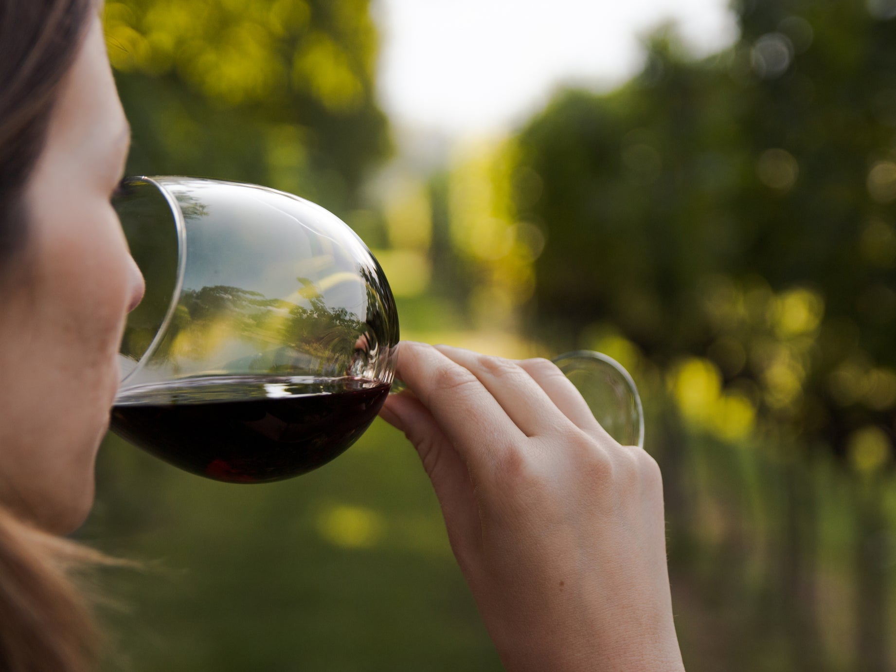 Woman drinks wine