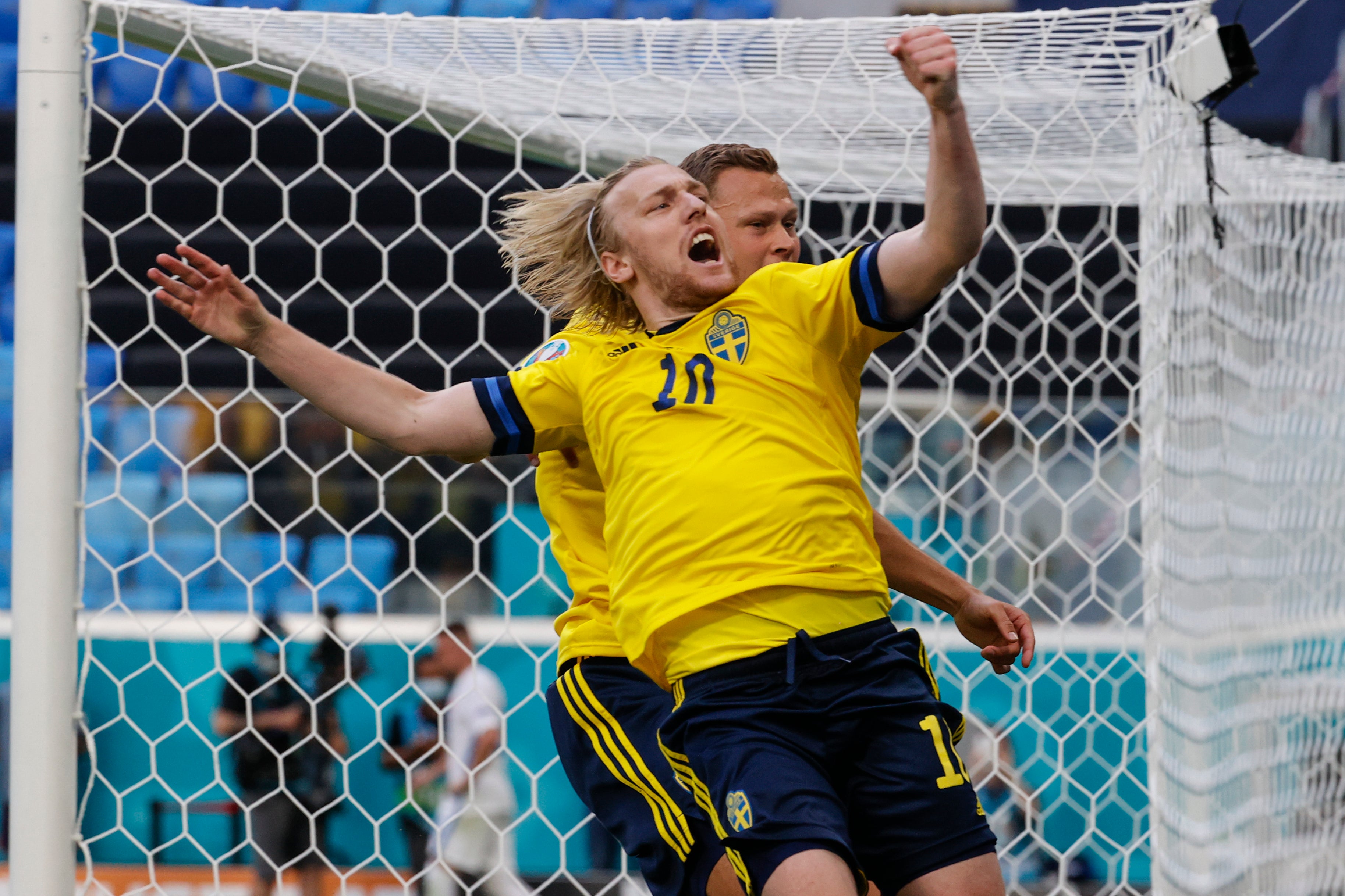 Emil Forsberg celebrates after scoring from the spot