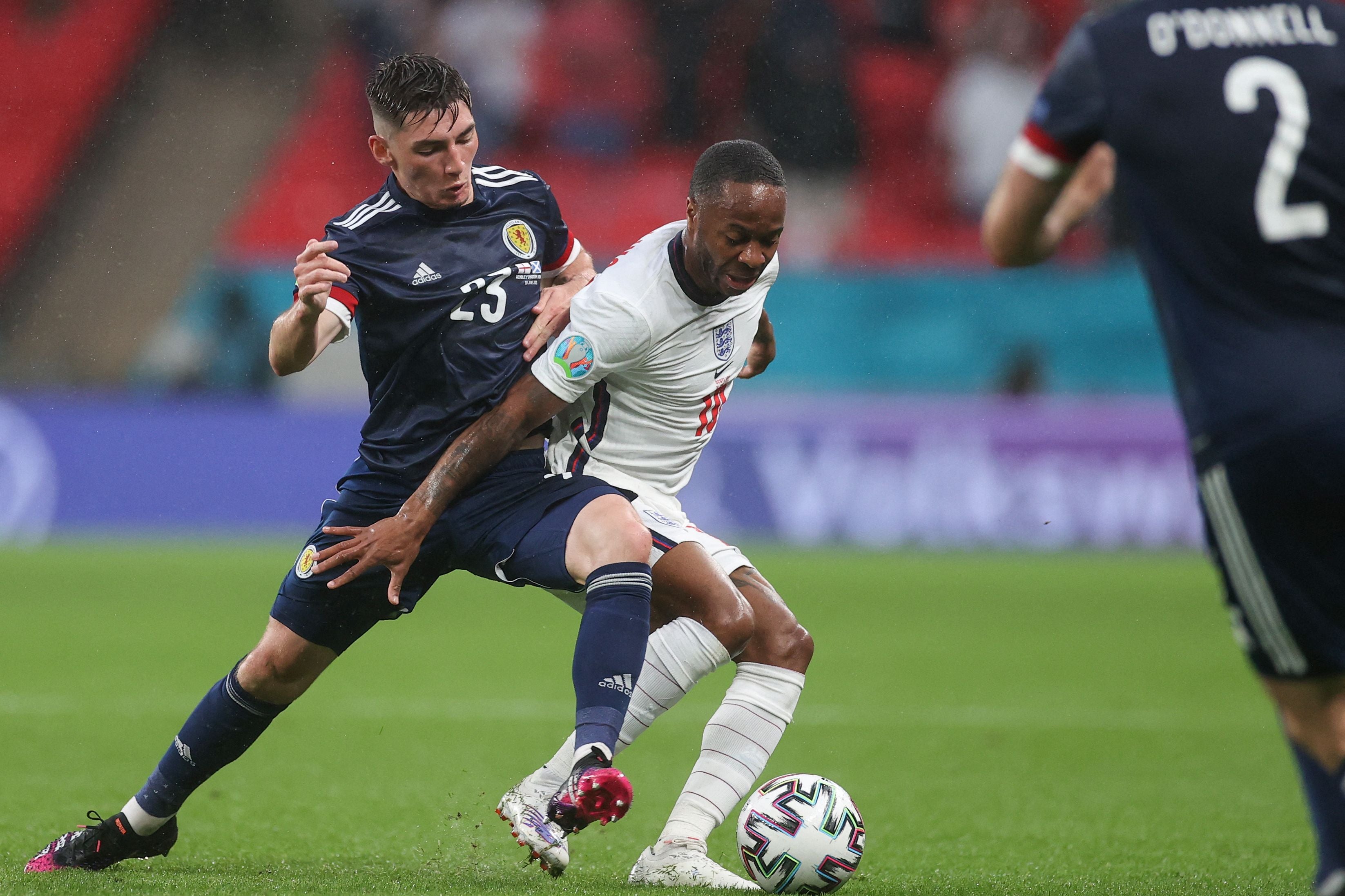 Billy Gilmour fights for the ball with Raheem Sterling