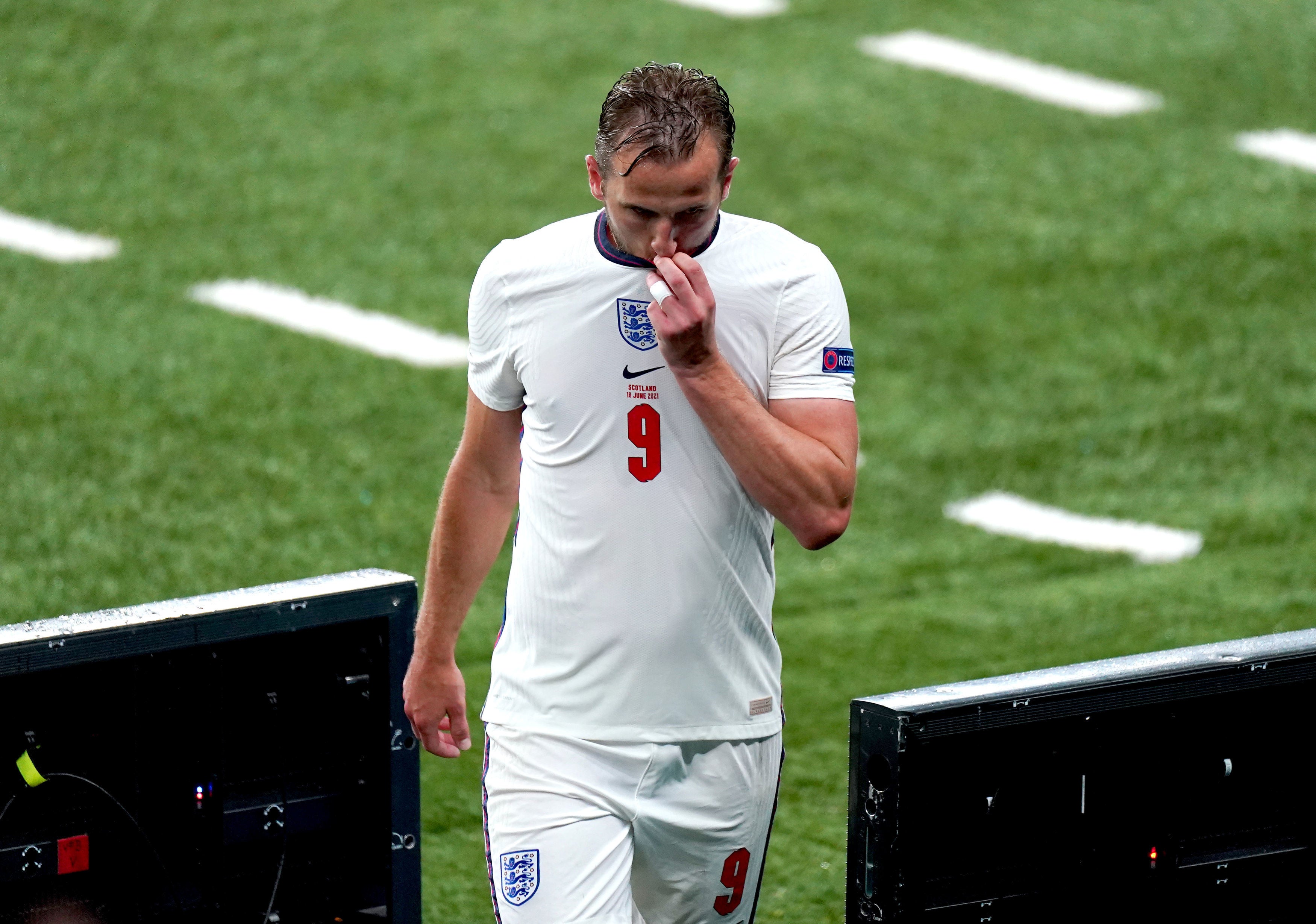 Harry Kane leaves the pitch after being substituted