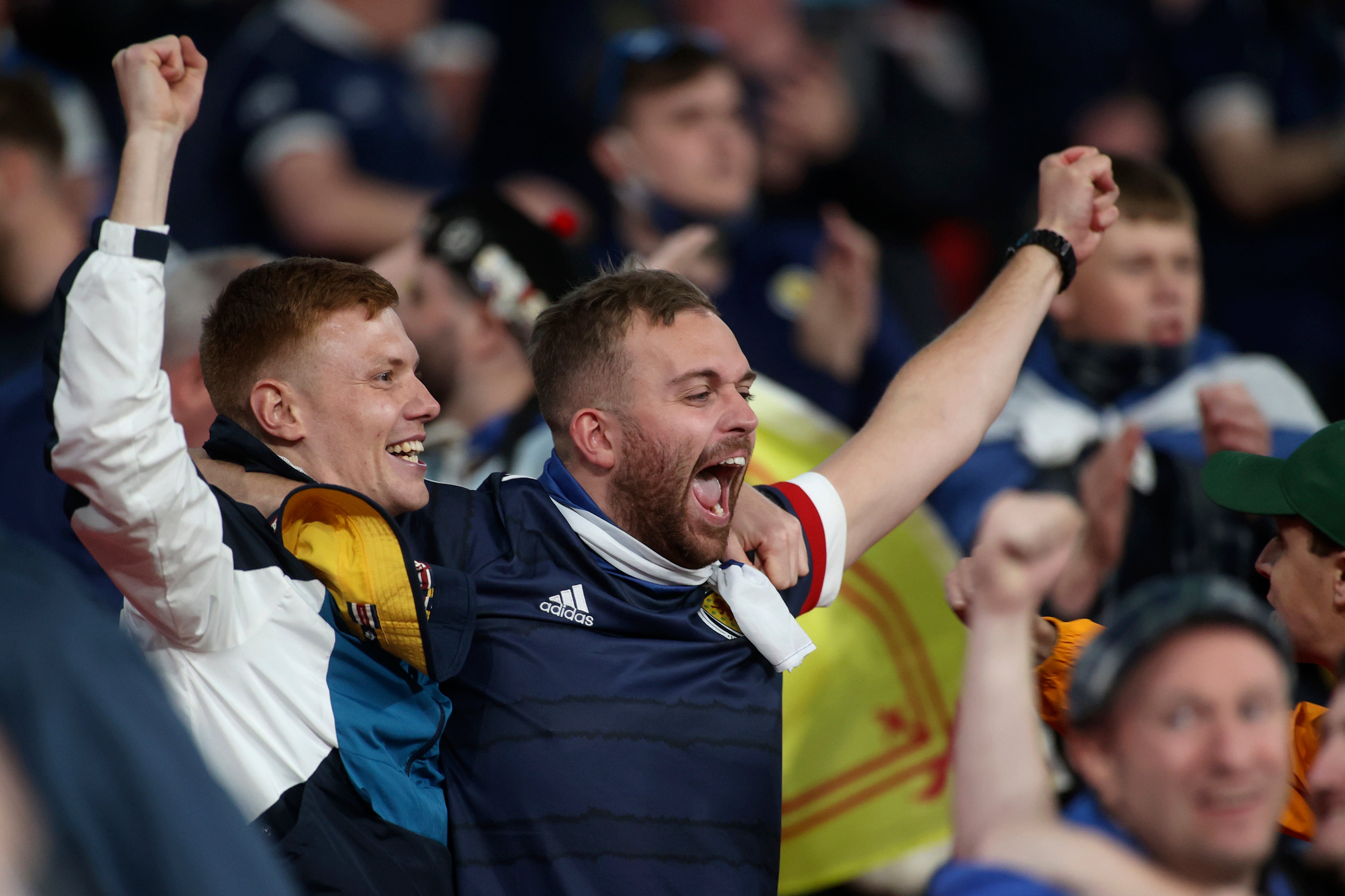 Scotland supporters celebrate at the end