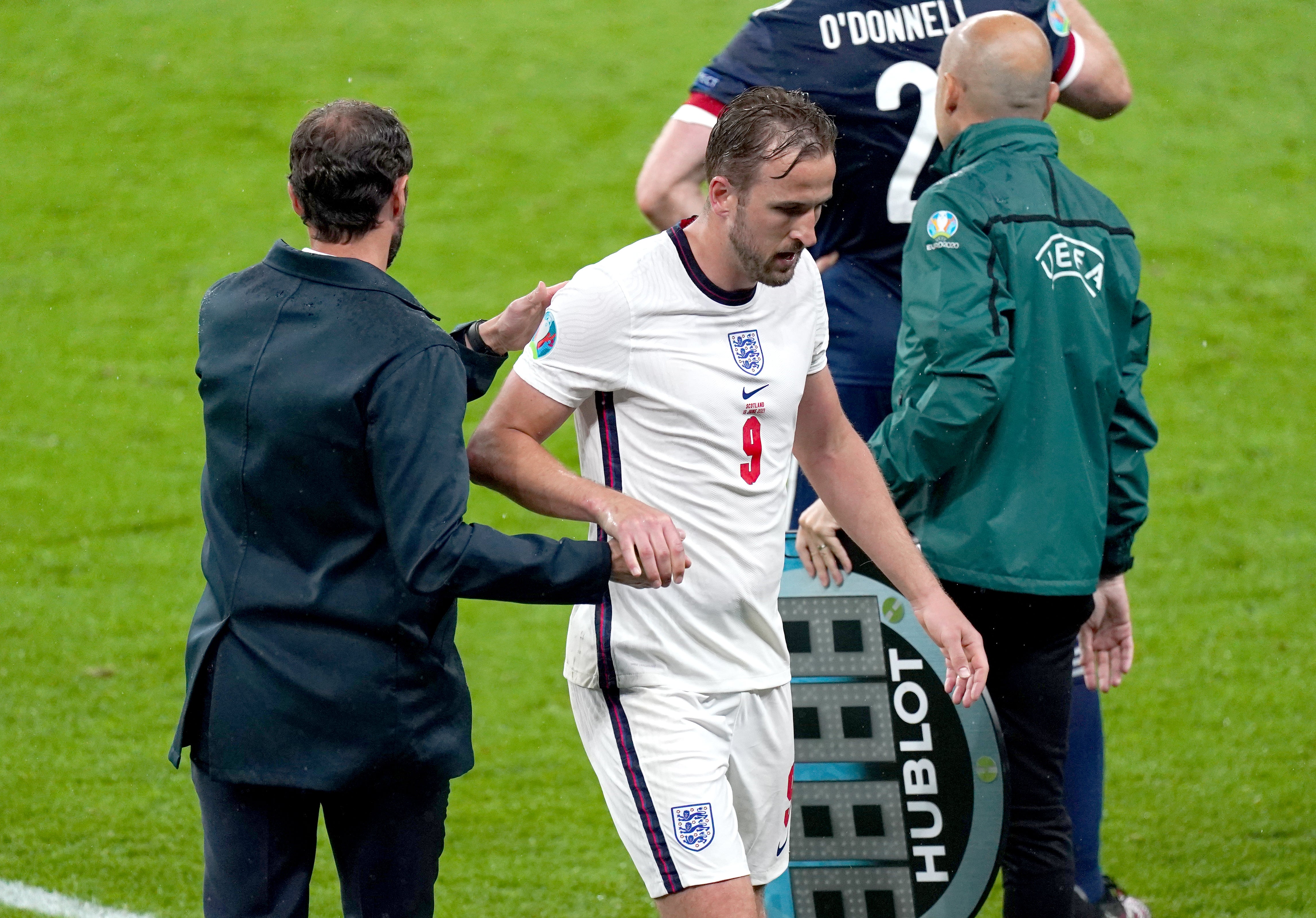 Harry Kane, centre, is substituted against Scotland