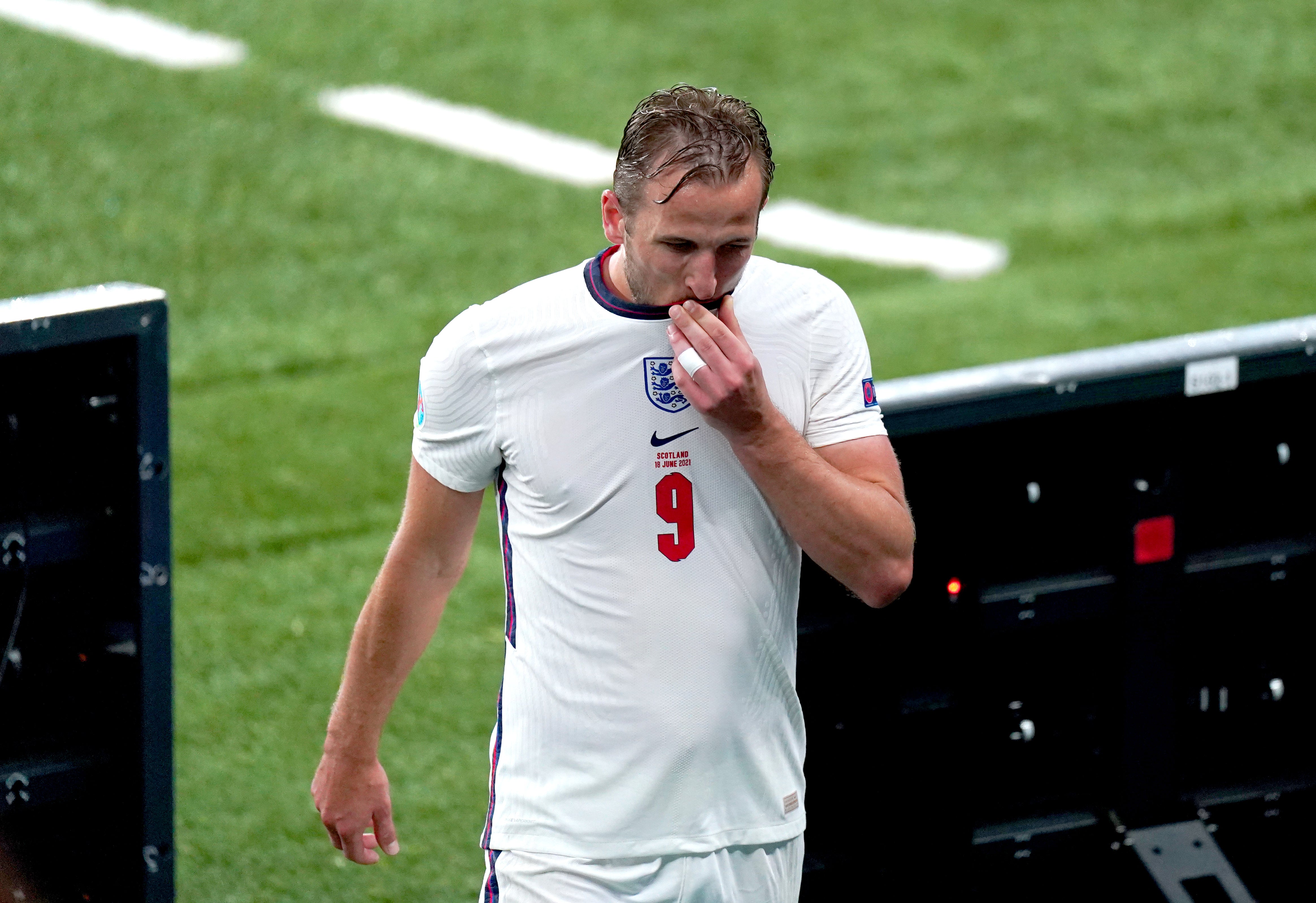 Harry Kane leaves the pitch after being substituted during the goalless draw with Scotland