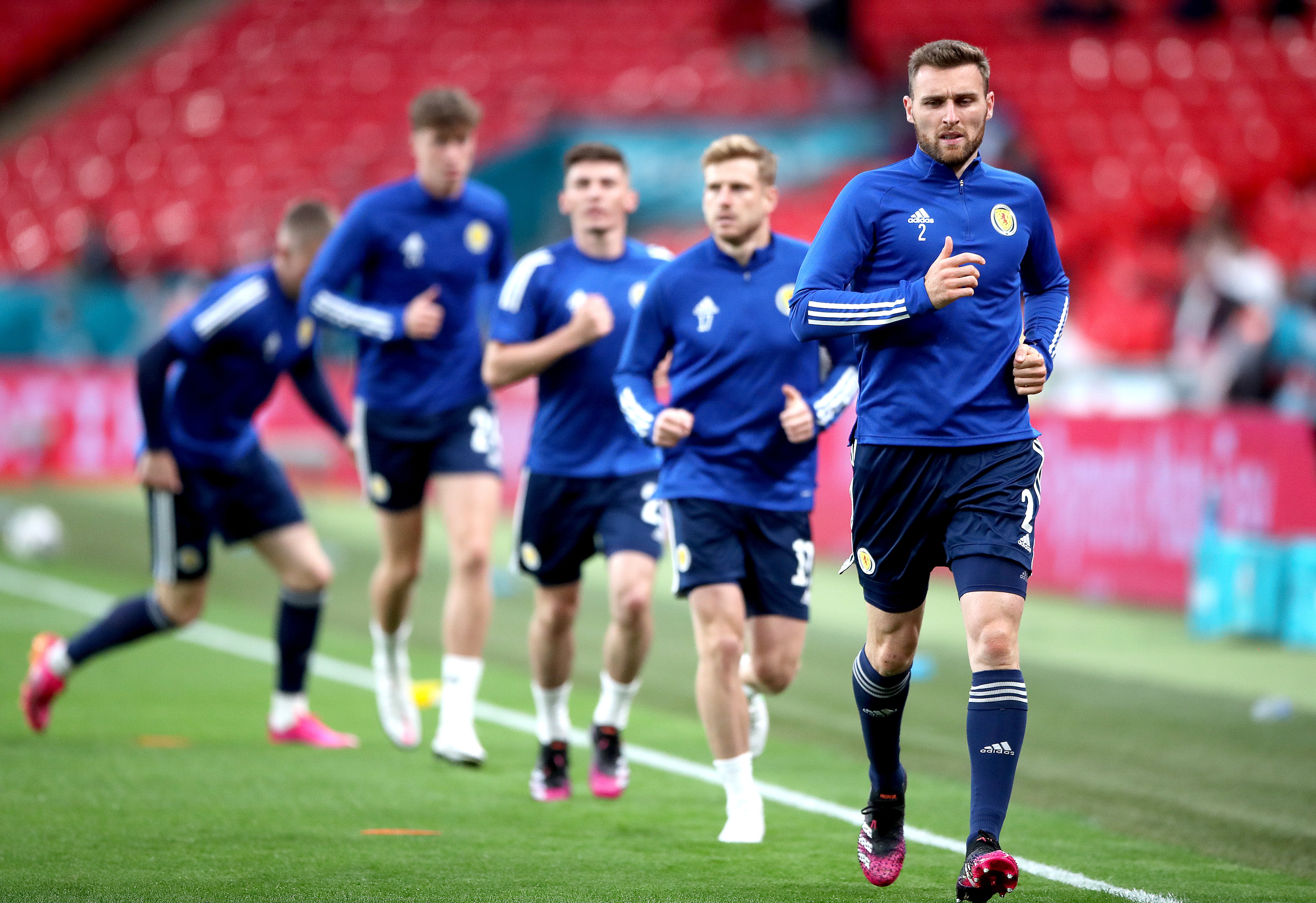 Scotland’s Stephen O’Donnell, right, warms up at Wembley