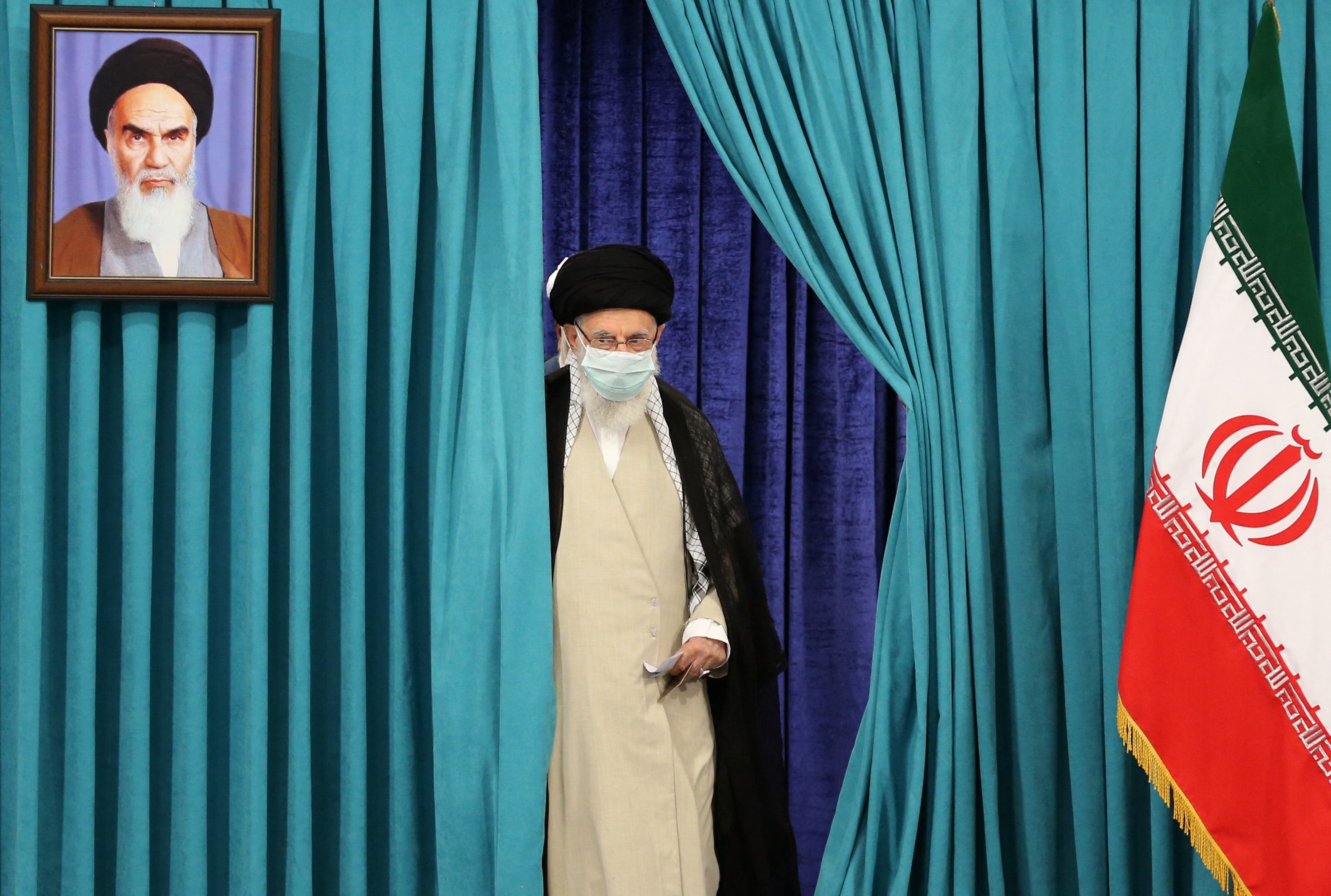 Iran’s supreme leader Ayatollah Khamenei casts his ballot