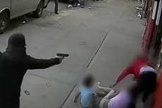 Chilling footage shows two children get caught up in New York shooting