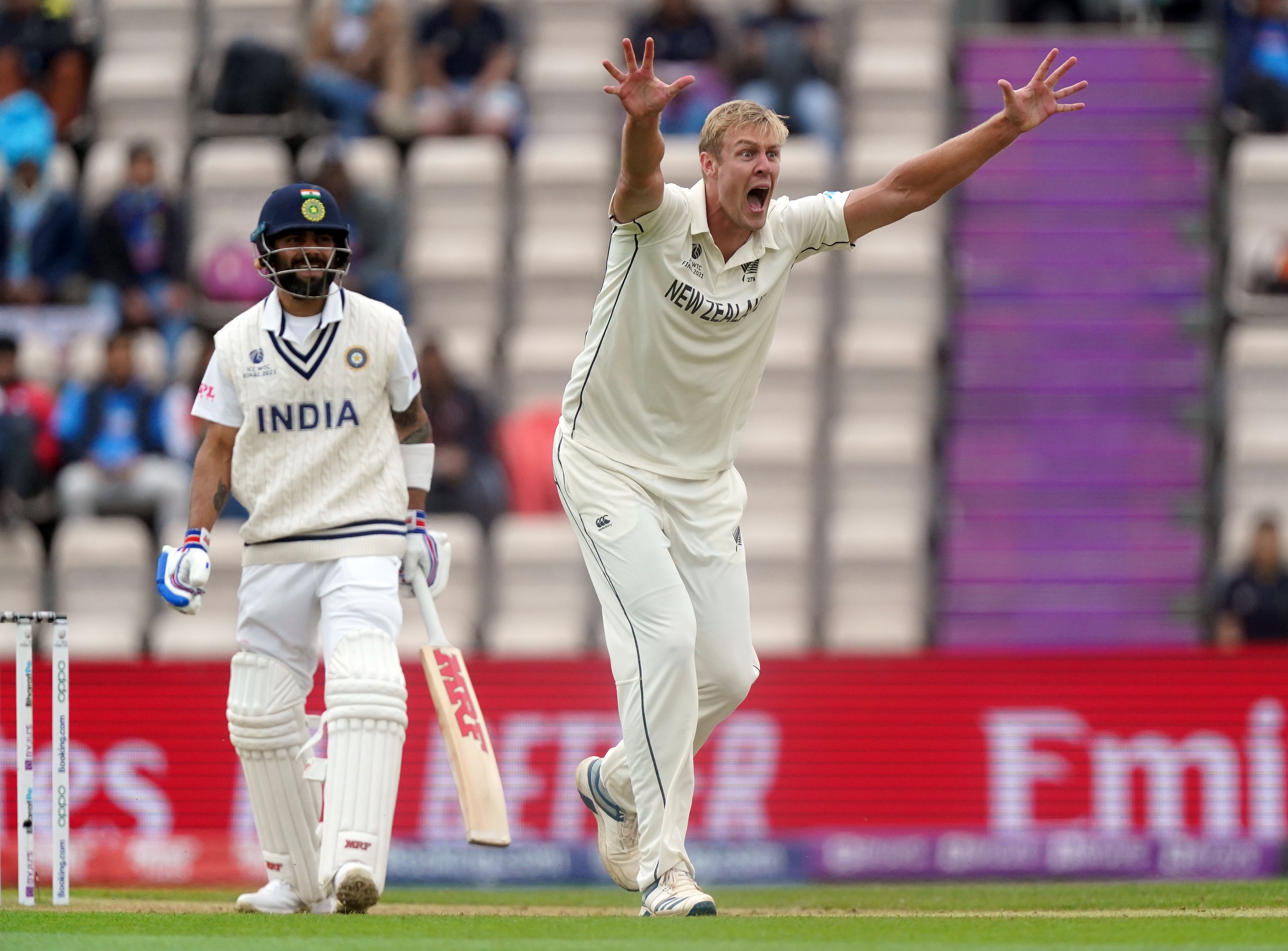 New Zealand’s Kyle Jamieson, right, appeals for the wicket of India’s Virat Kohli