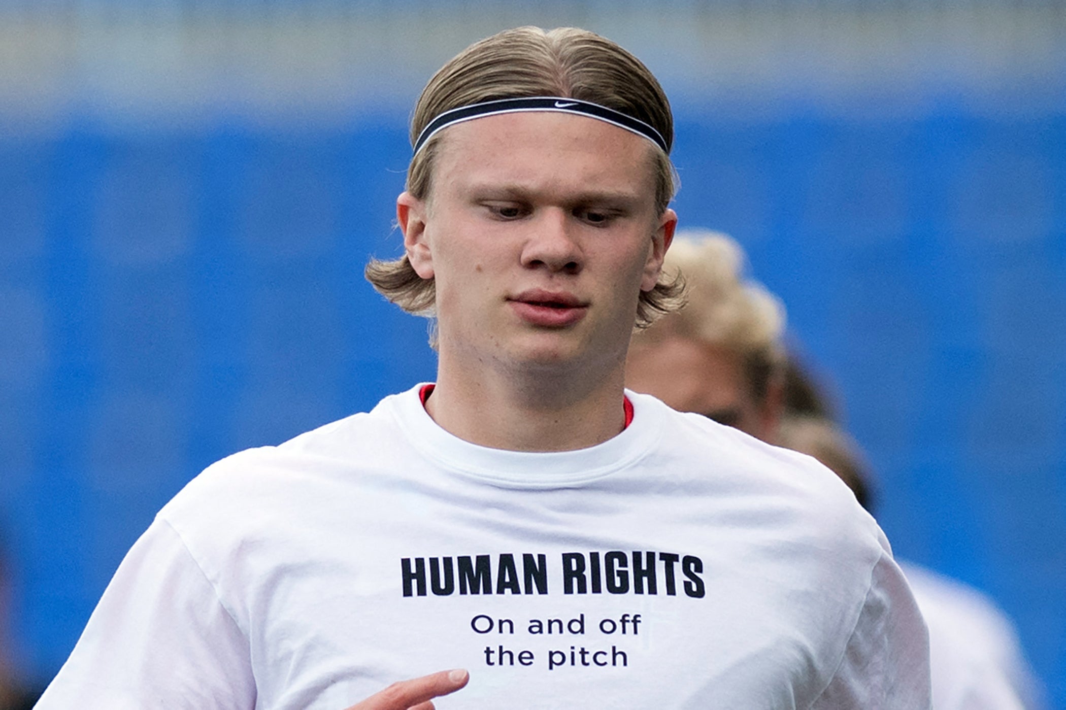 Norway’s forward Erling Braut Haaland wears a t-shirt with the slogan ‘Human rights, on and off the pitch’ as he warms up before the FIFA World Cup Qatar 2022 qualification football match against Turkey in March