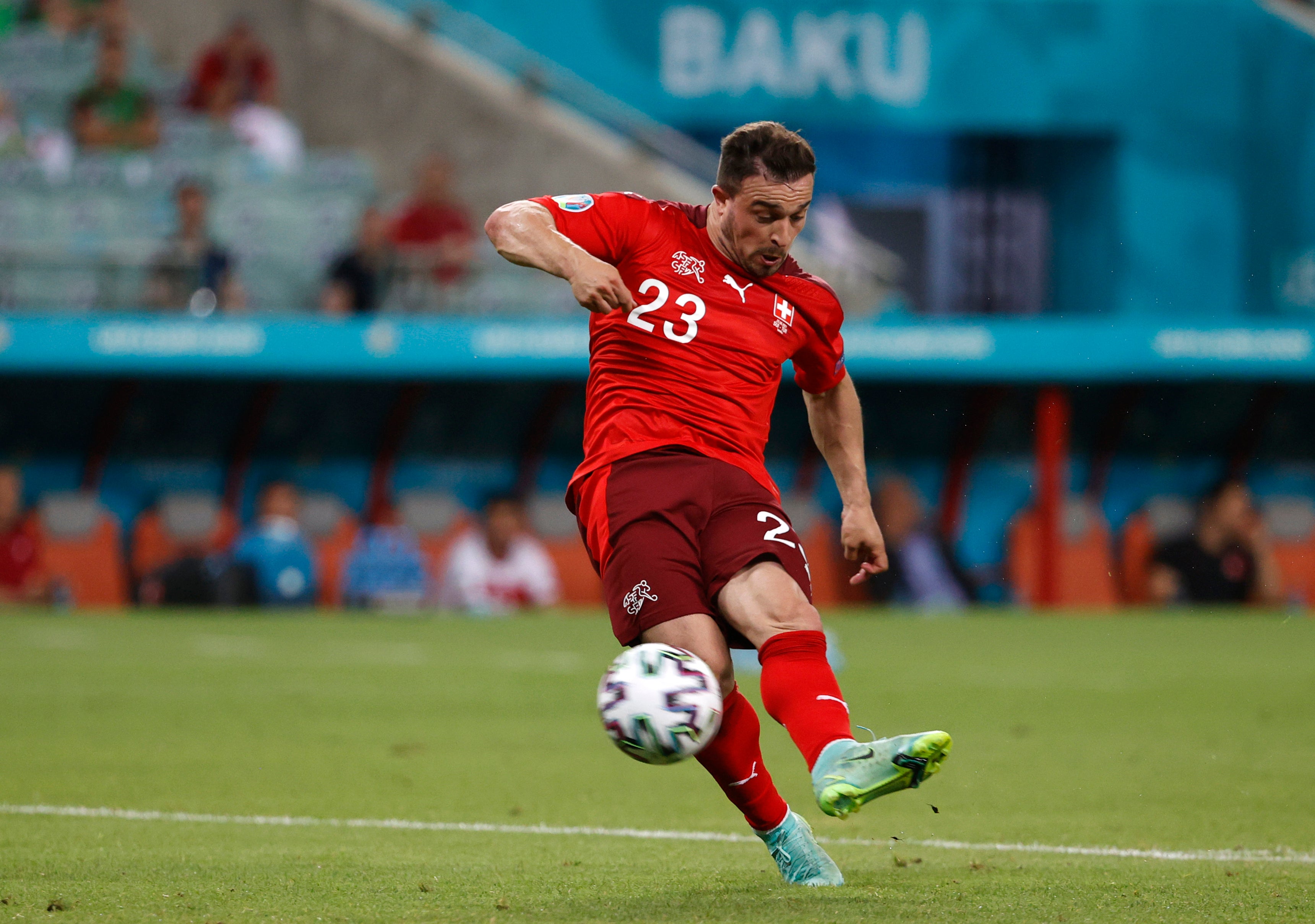 Xherdan Shaqiri scores Switzerland's third goal in their 3-1 win against Turkey