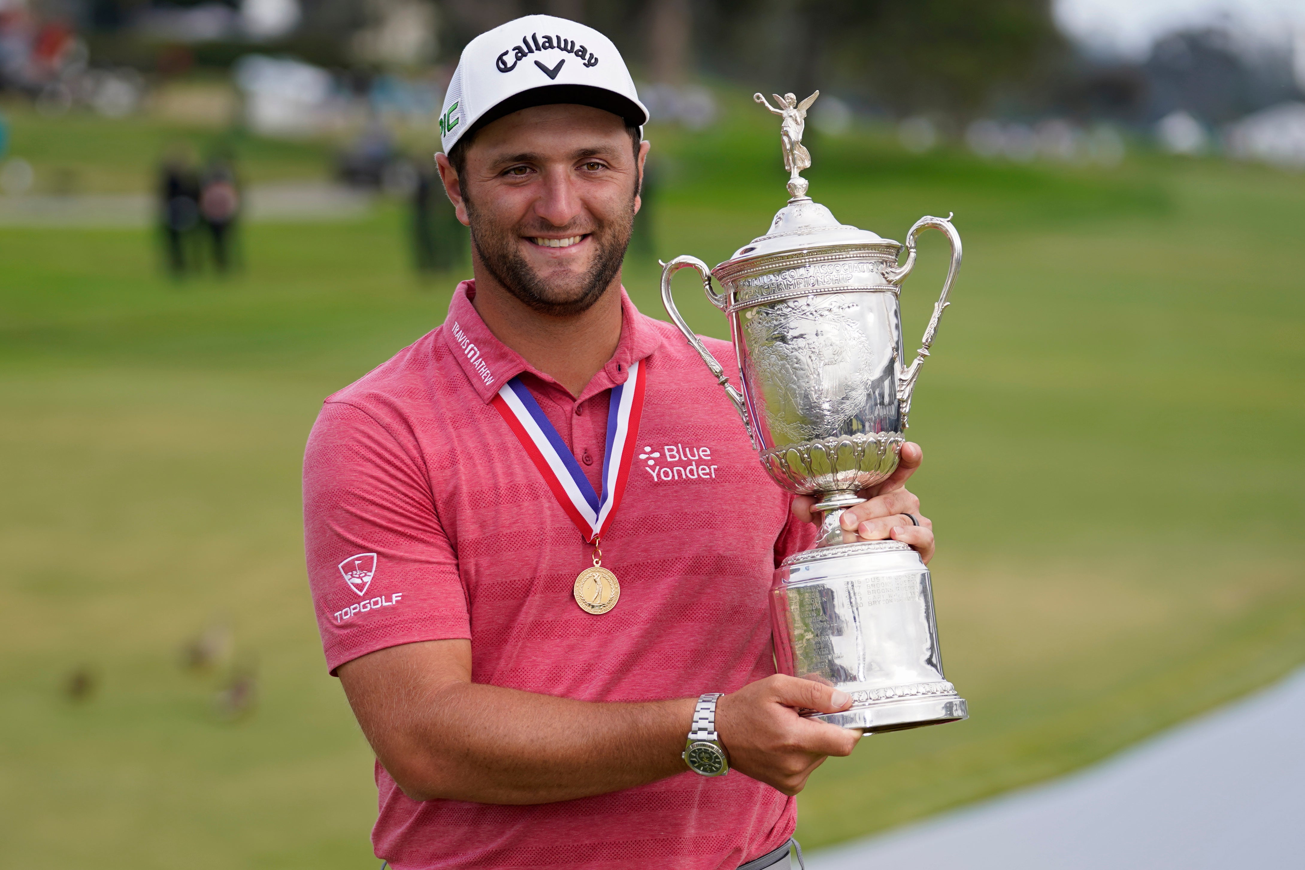 Jon Rahm holding the US Open trophy