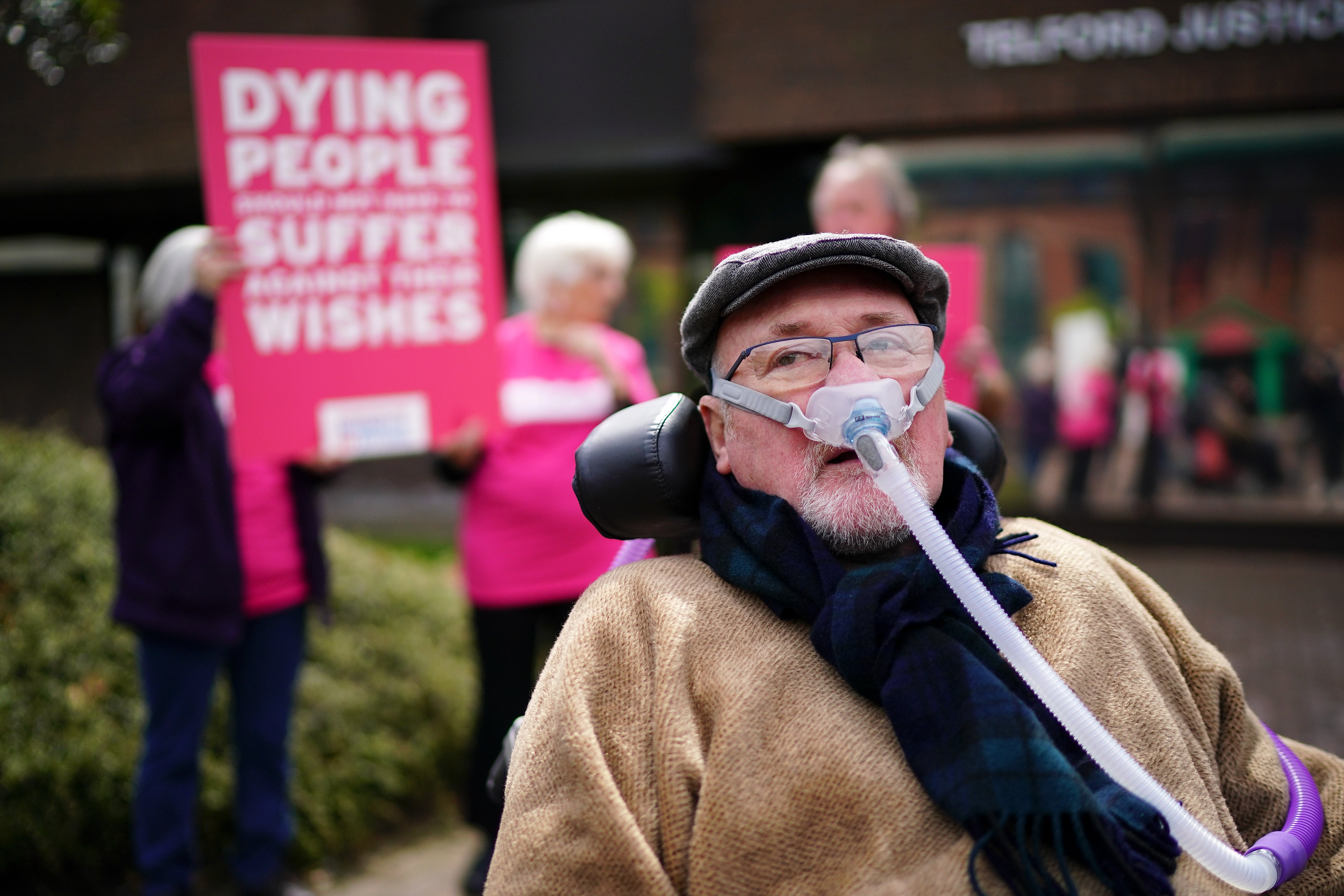 Motor neurone disease sufferer Noel Conway, 67, poses for the media outside Telford County Court