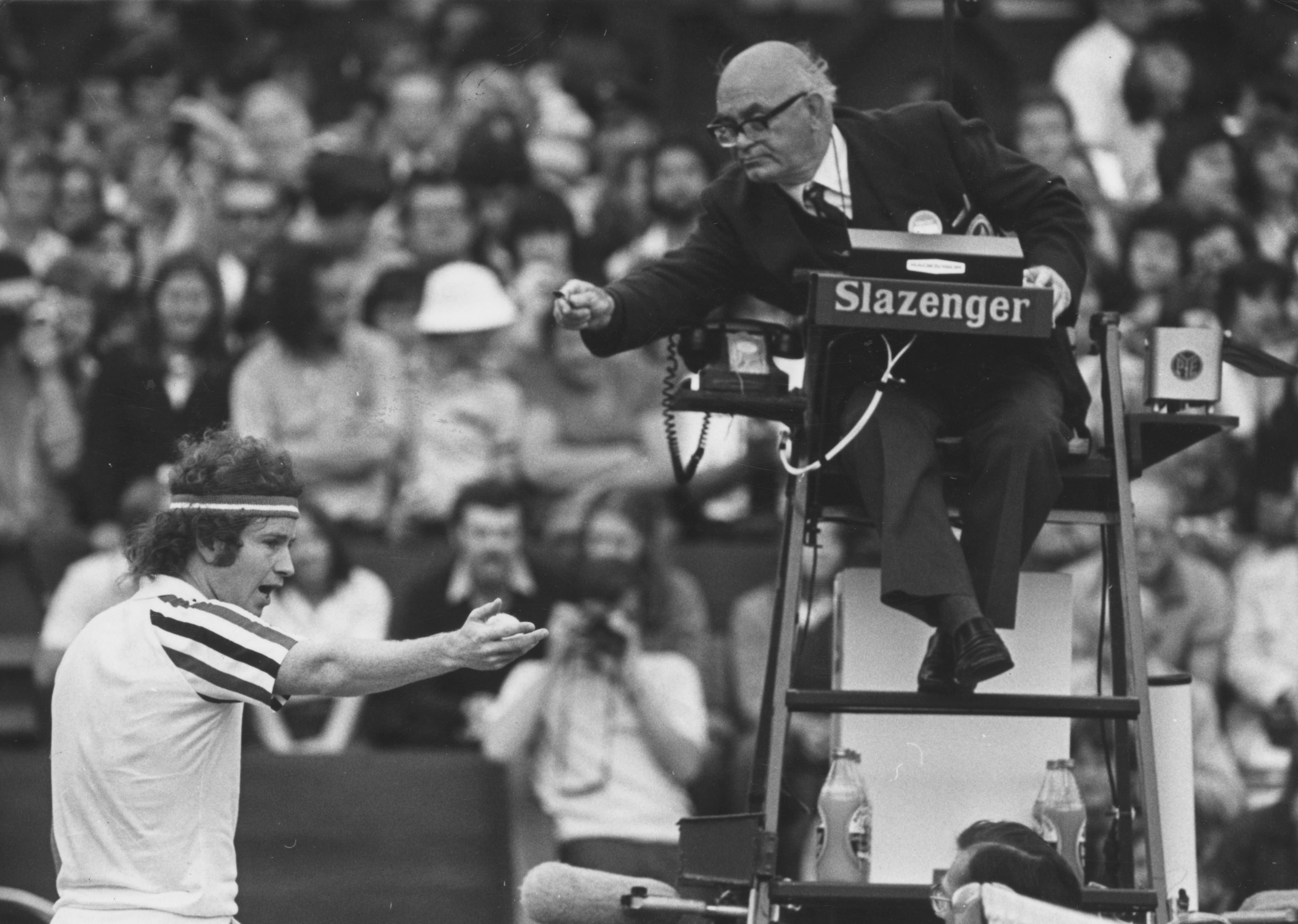 McEnroe argues a point with the umpire during a match against Jimmy Connors