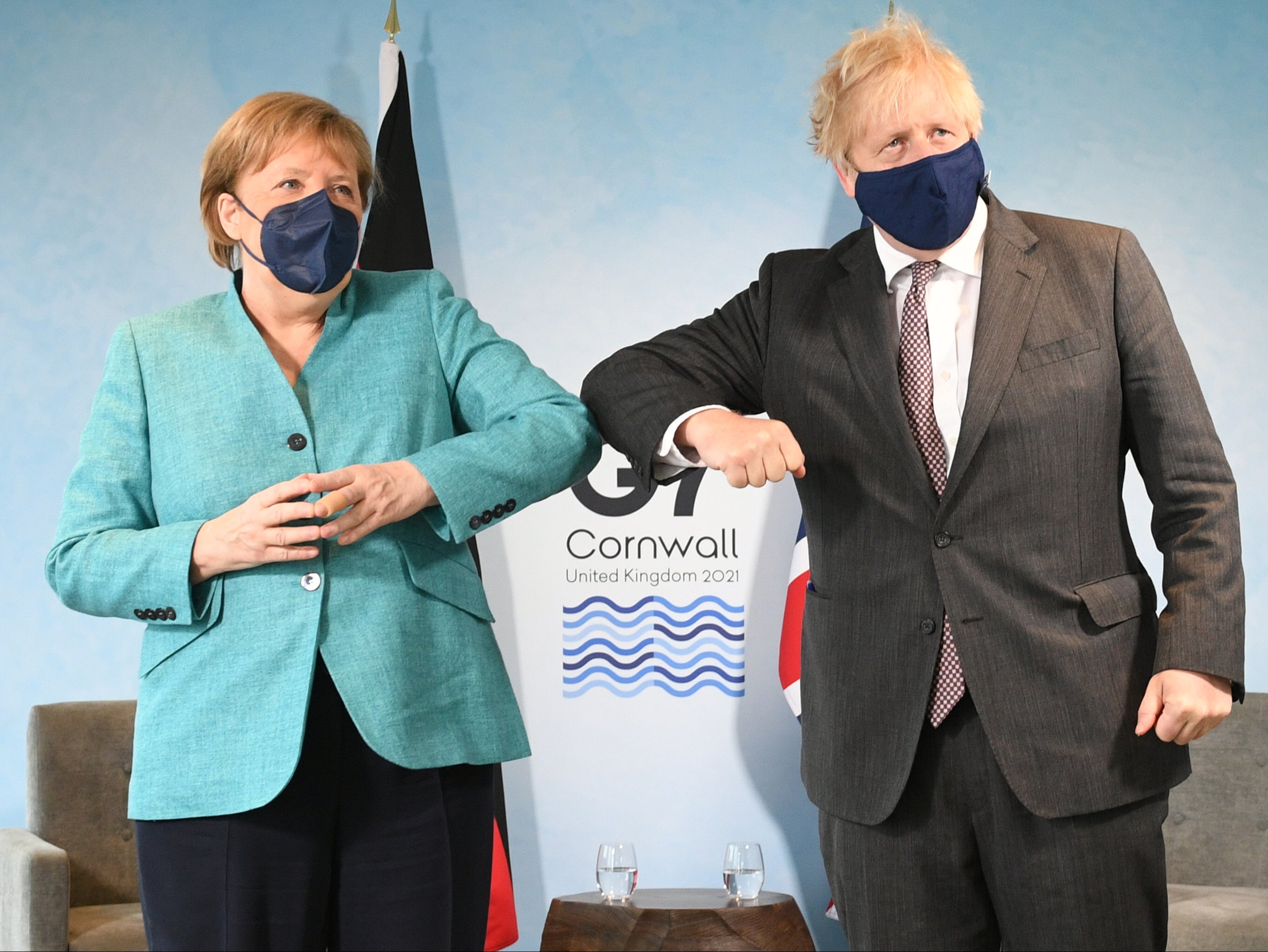 Johnson greets Merkel at the G7 summit in Cornwall last month