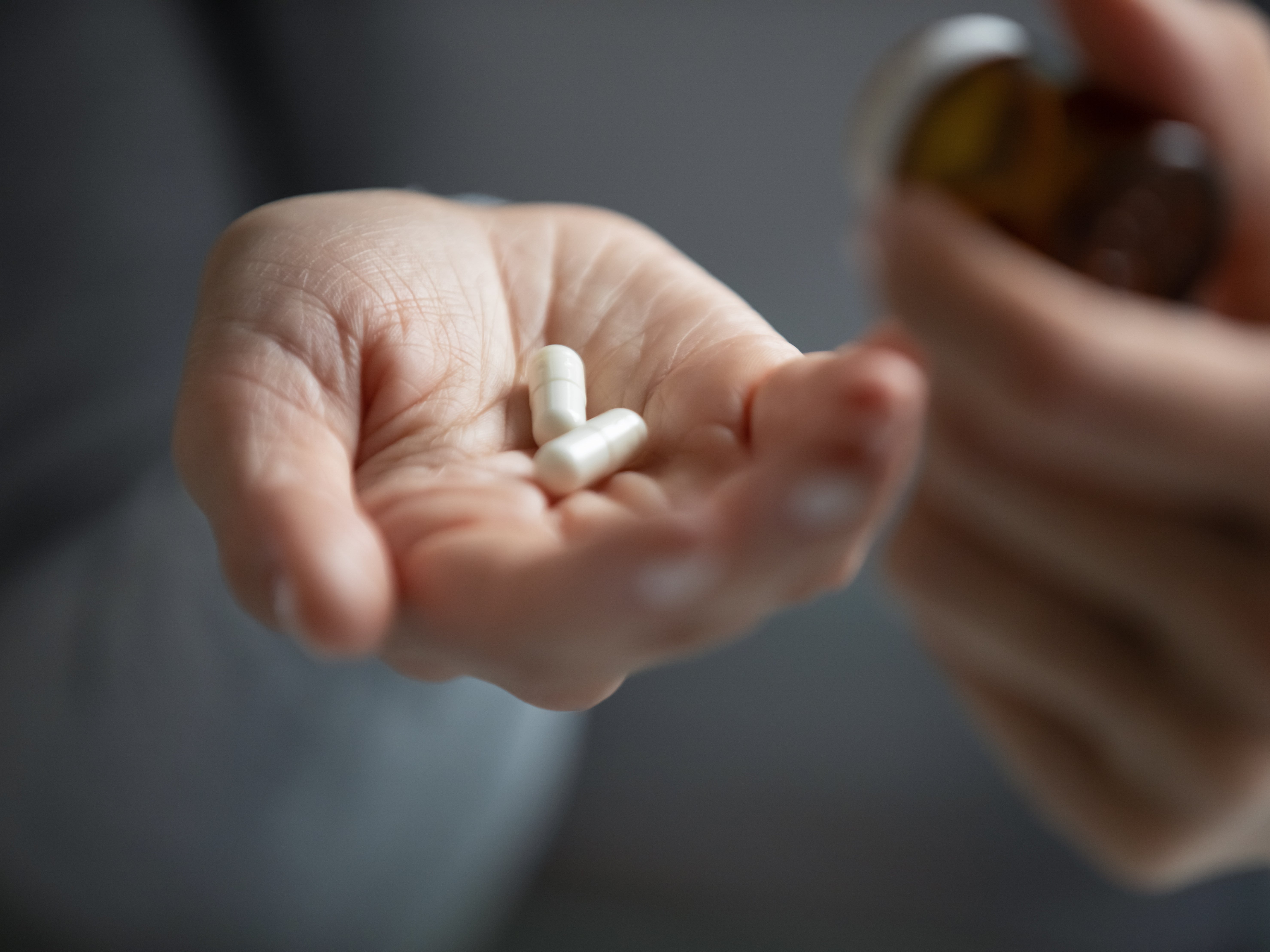 A person holds antidepressants