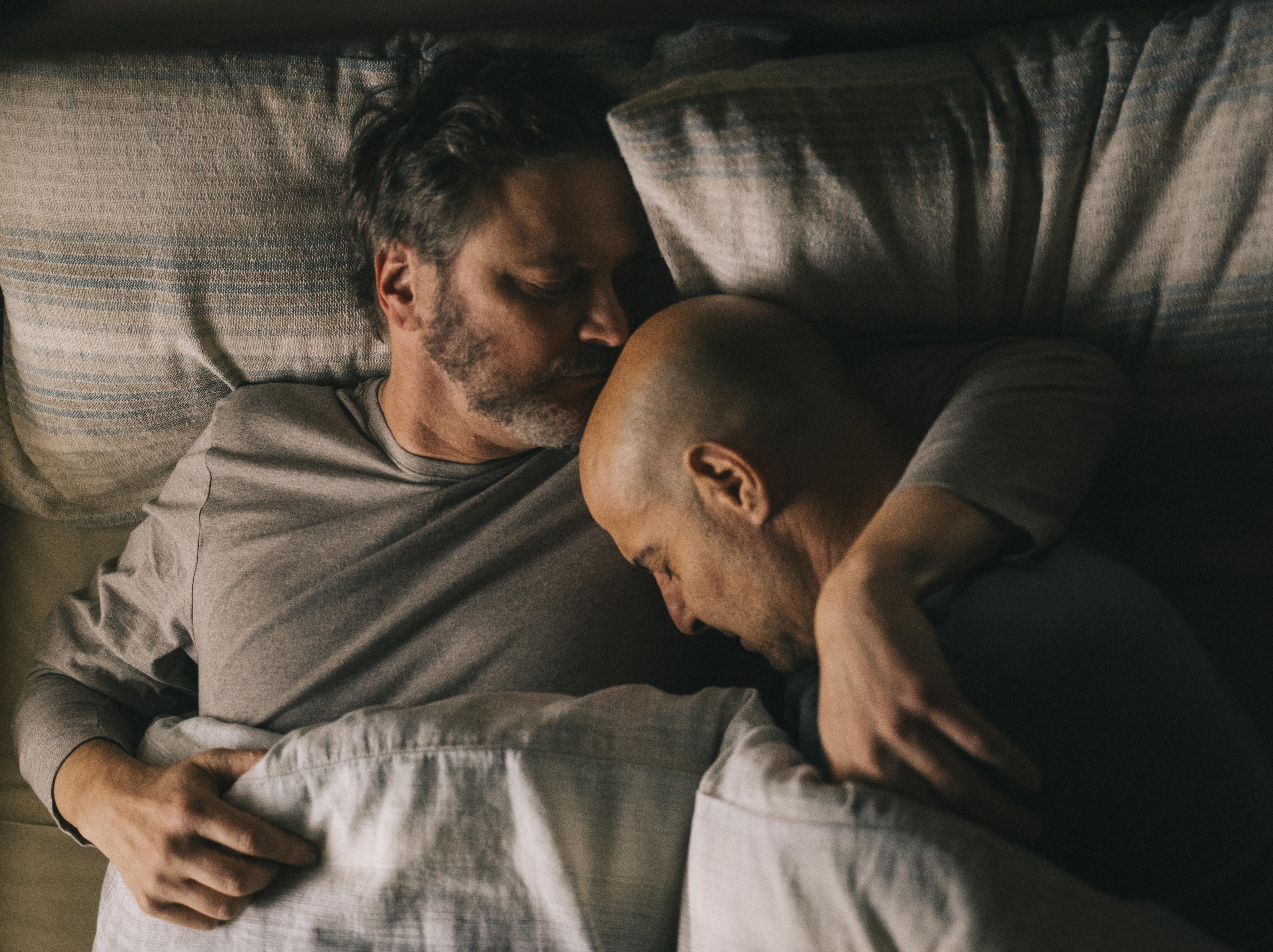 Sam (Colin Firth) and Tusker’s (Stanley Tucci) affections are expressed through gestures, not words – in how the two men’s bodies fold into each other as they sleep