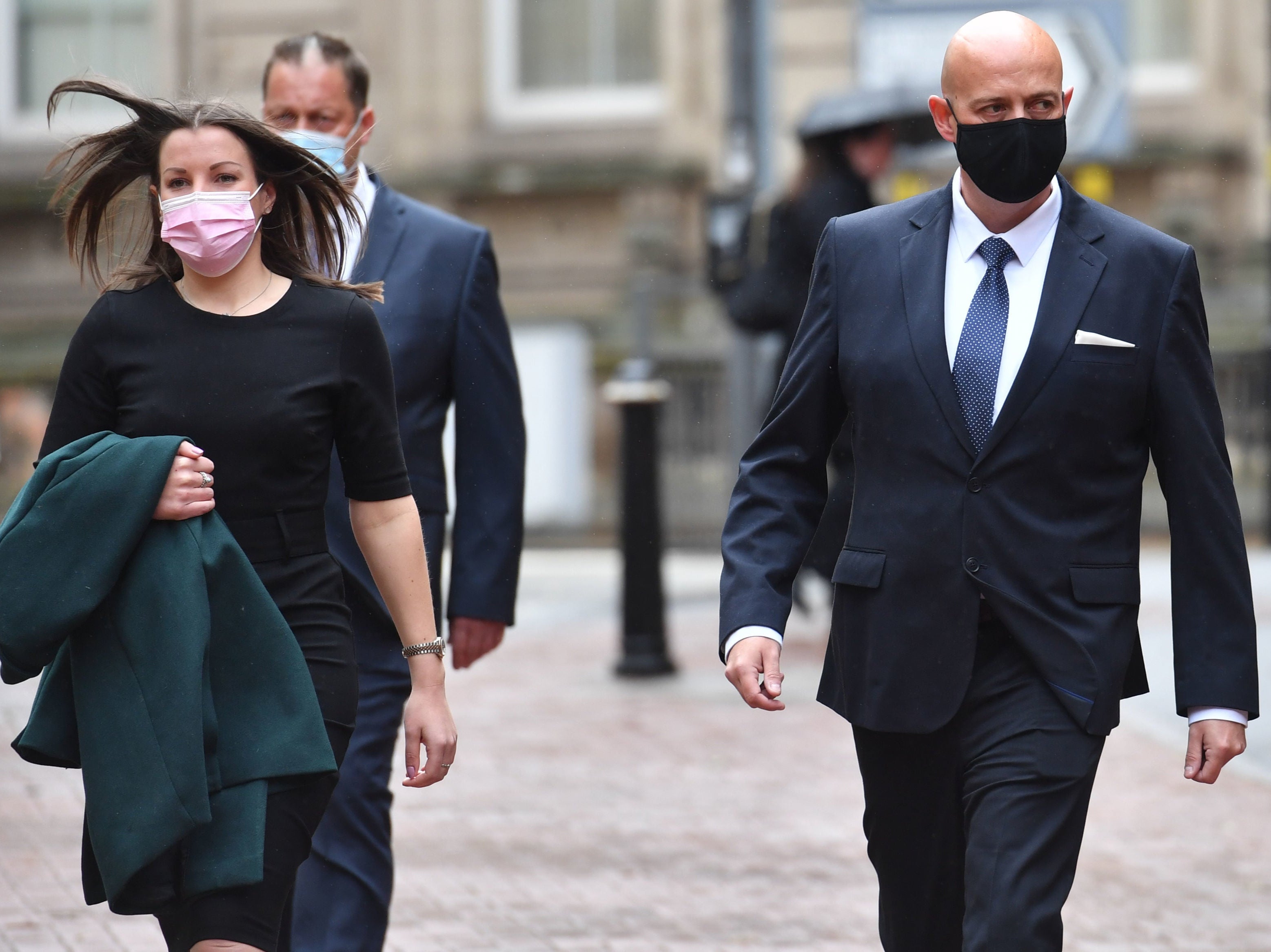 West Mercia Police Constables Benjamin Monk (right) and Mary Ellen Bettley-Smith (left) arrive at Birmingham Crown Court