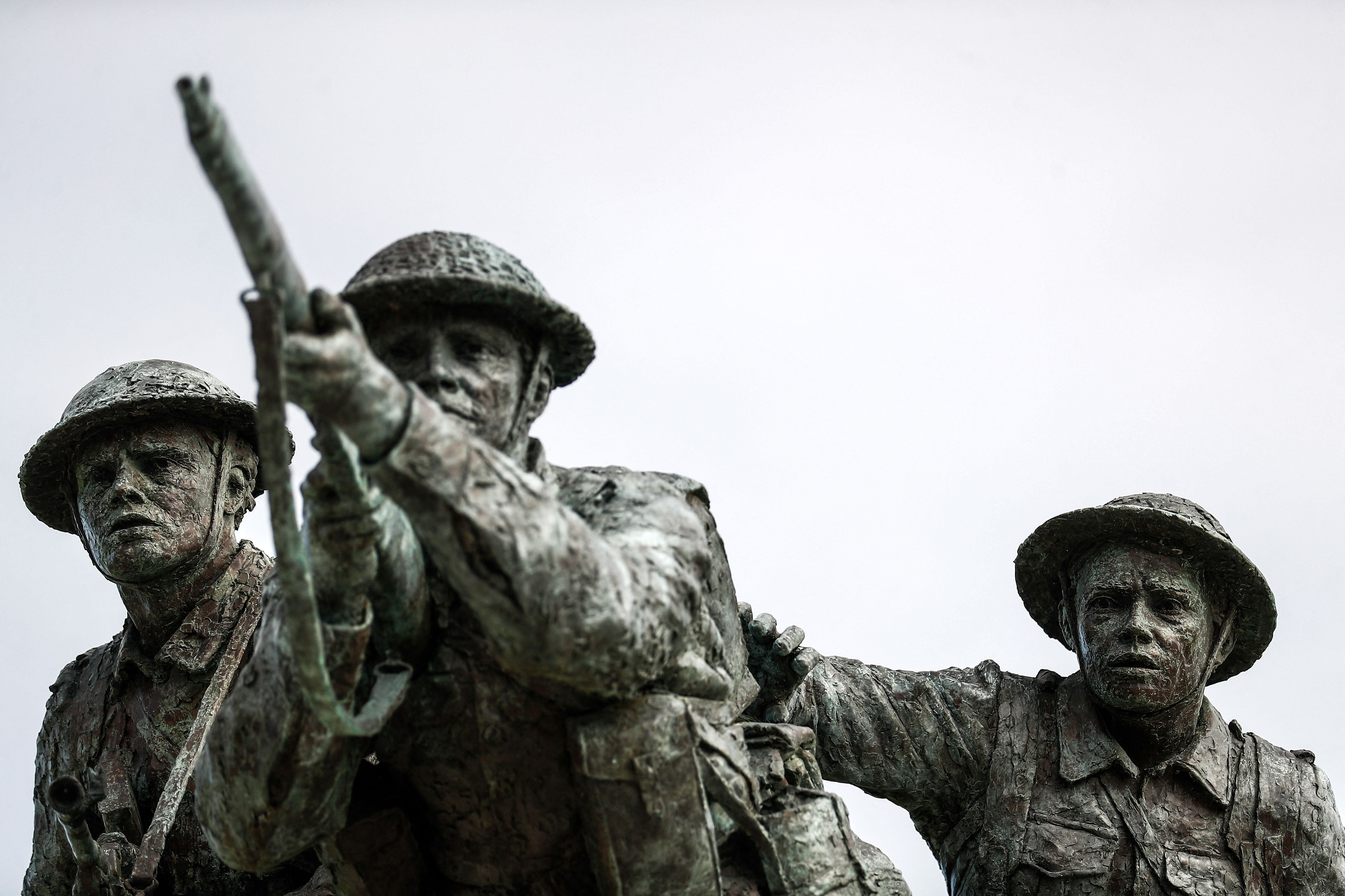 Williams-Ellis’s bronze sculpture of three charging infantrymen looks out to sea