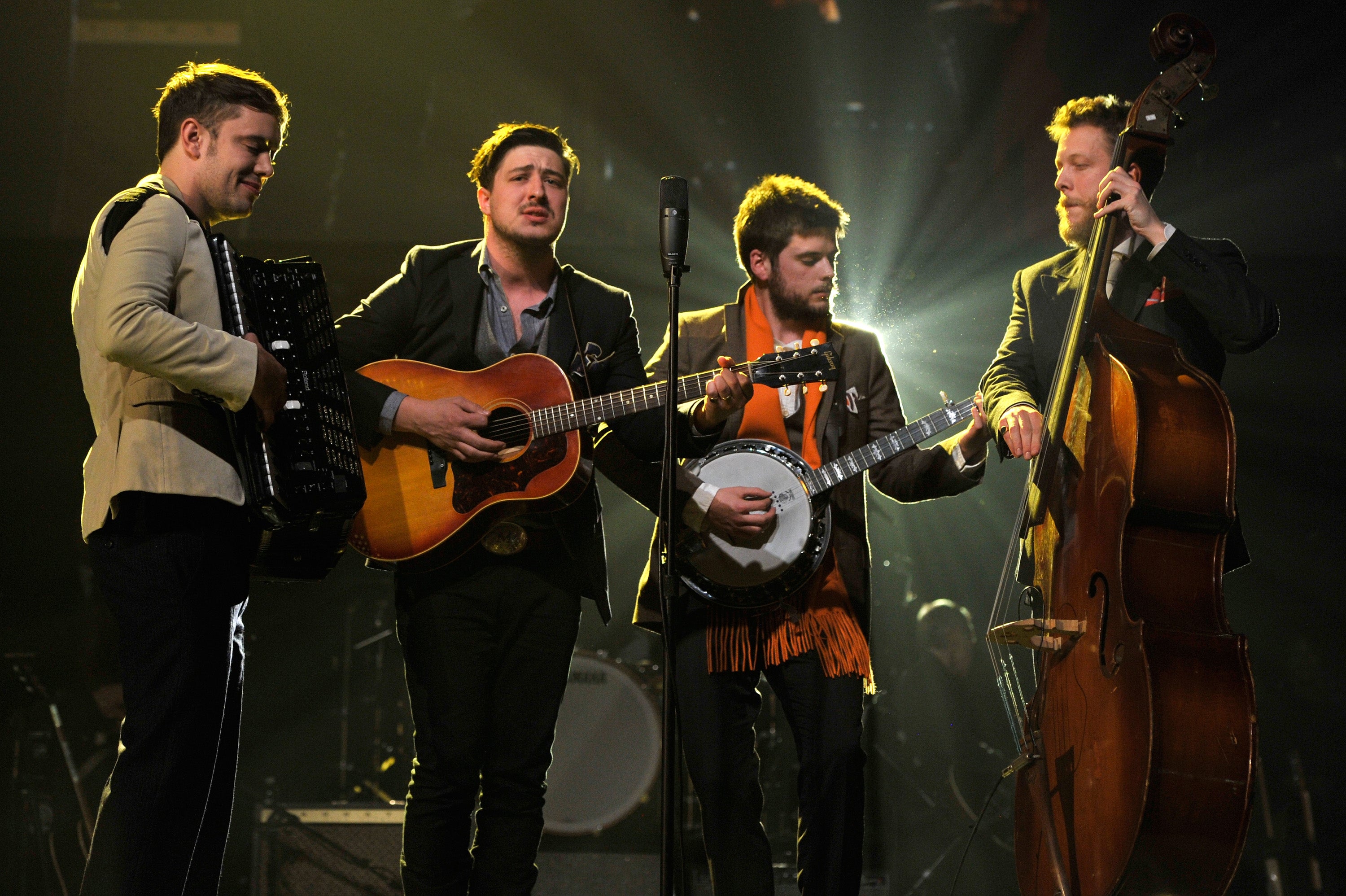 Mumford and Sons performing live