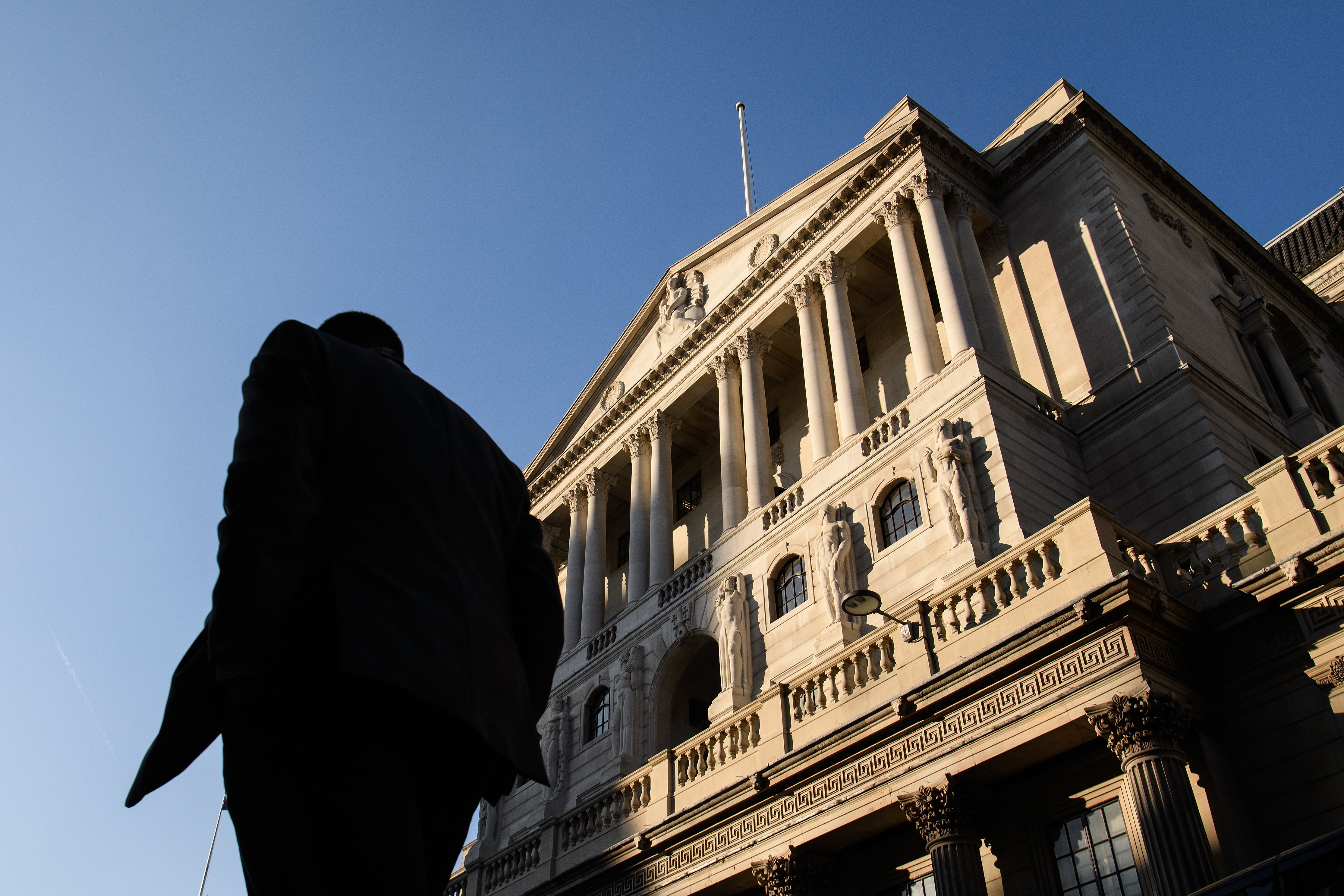 City workers walk past the Bank of England, in the financial district, also known as the Square Mile, on 24 January, 2017 in London, England