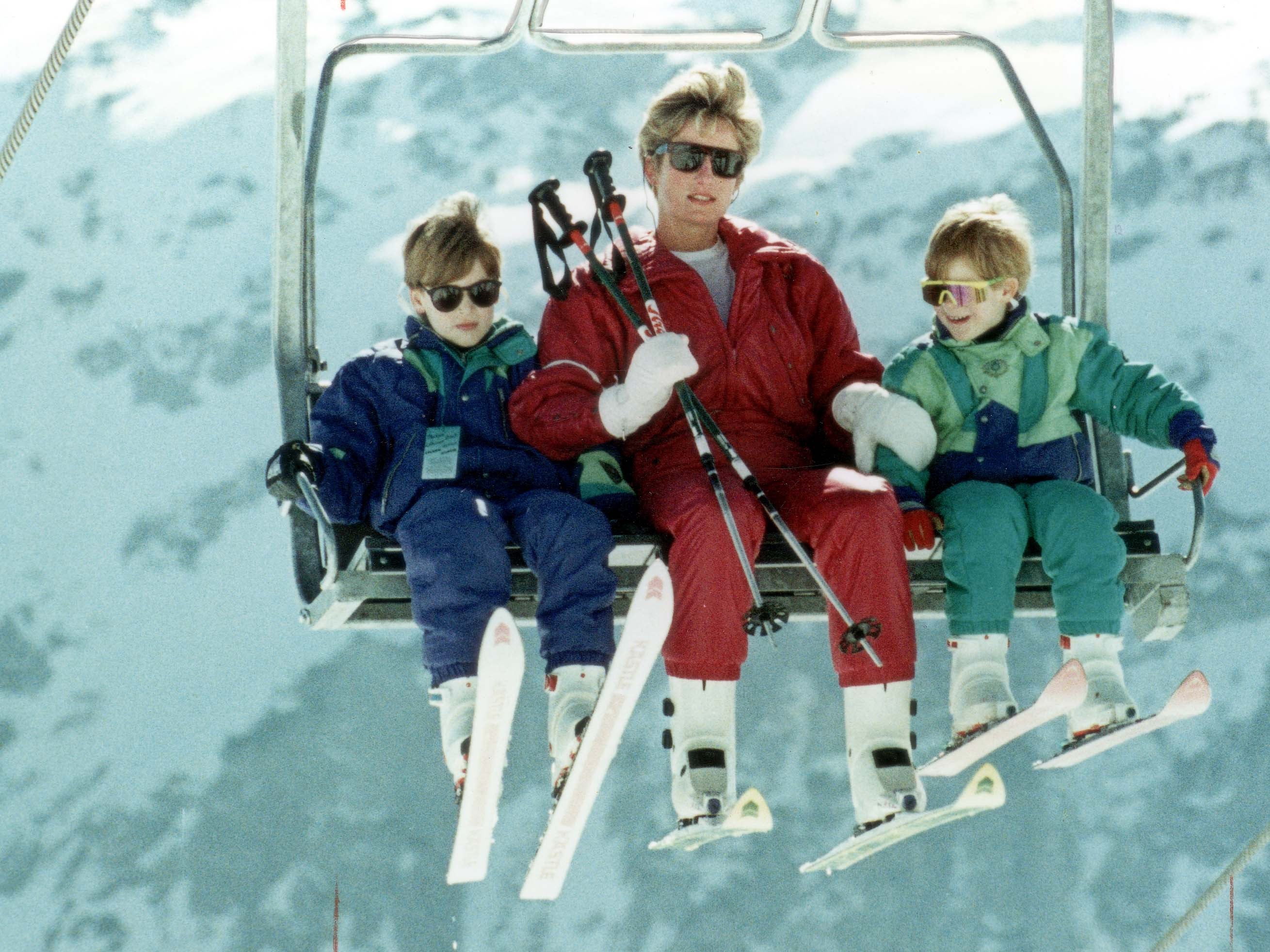 Diana on a ski lift with William and Harry in Austria, 1991