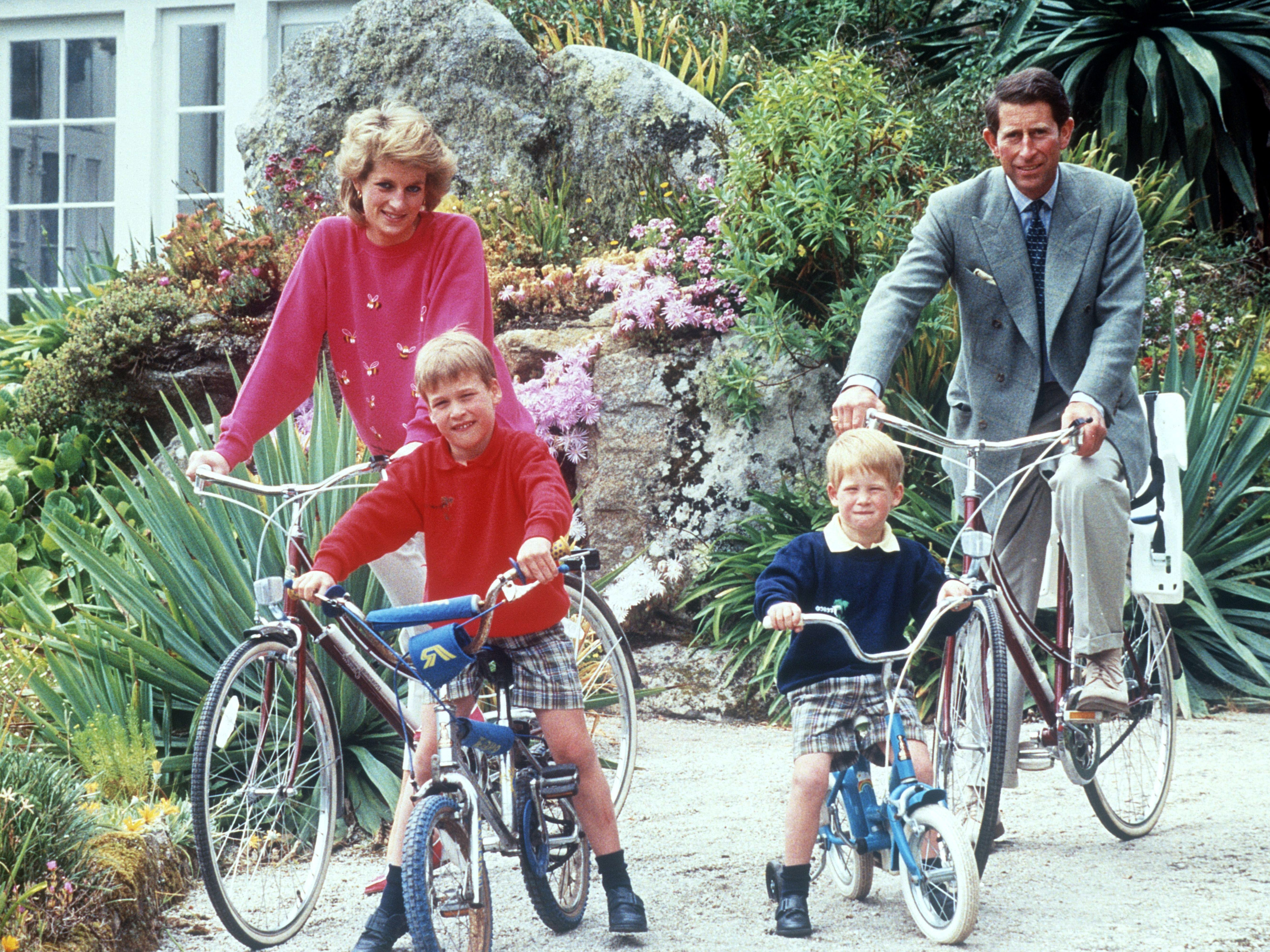 Princess Diana, Prince Charles, Prince William and Prince Harry on a bike ride in 1989